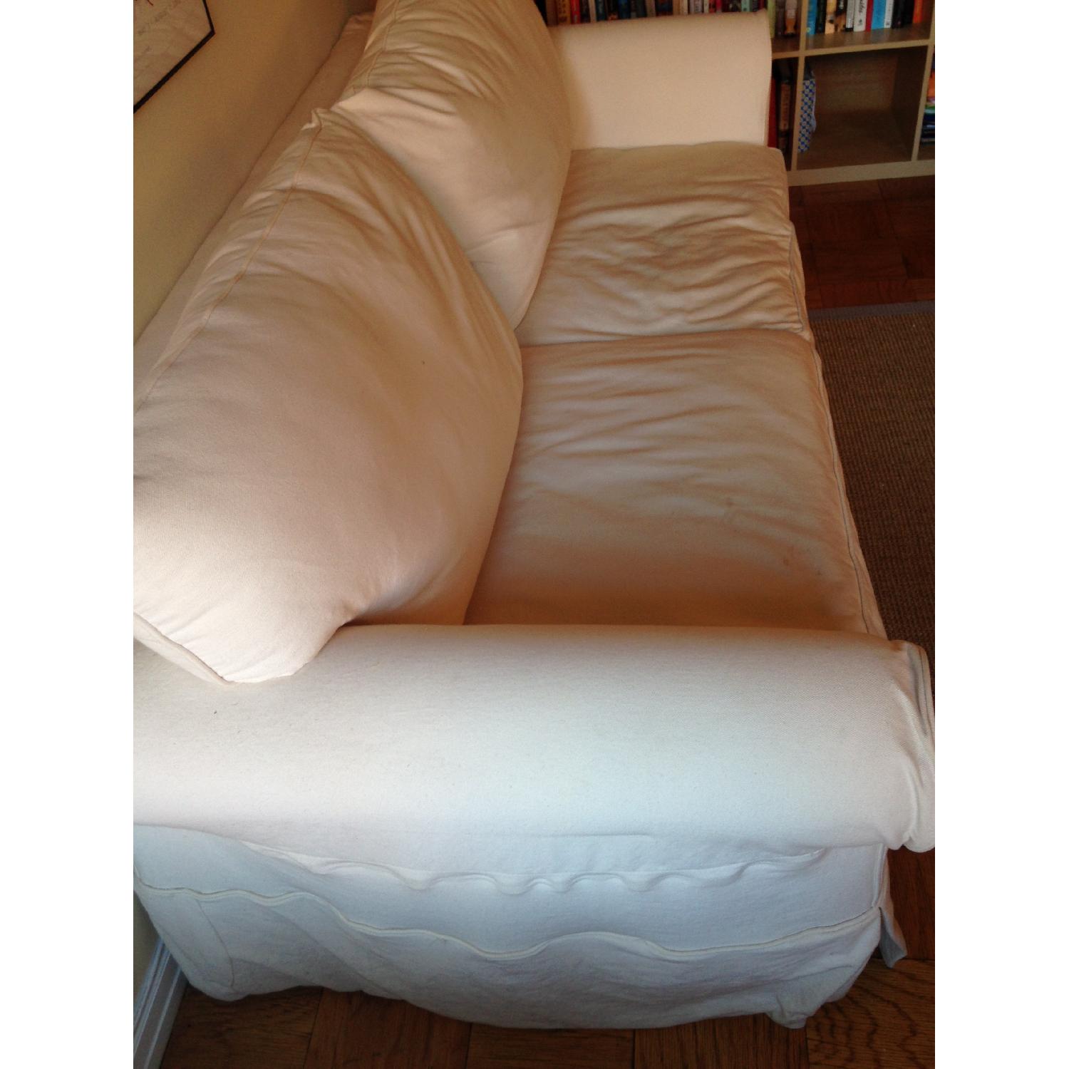 Jennifer Convertibles White Sofa with Pull Out Sofa Bed AptDeco