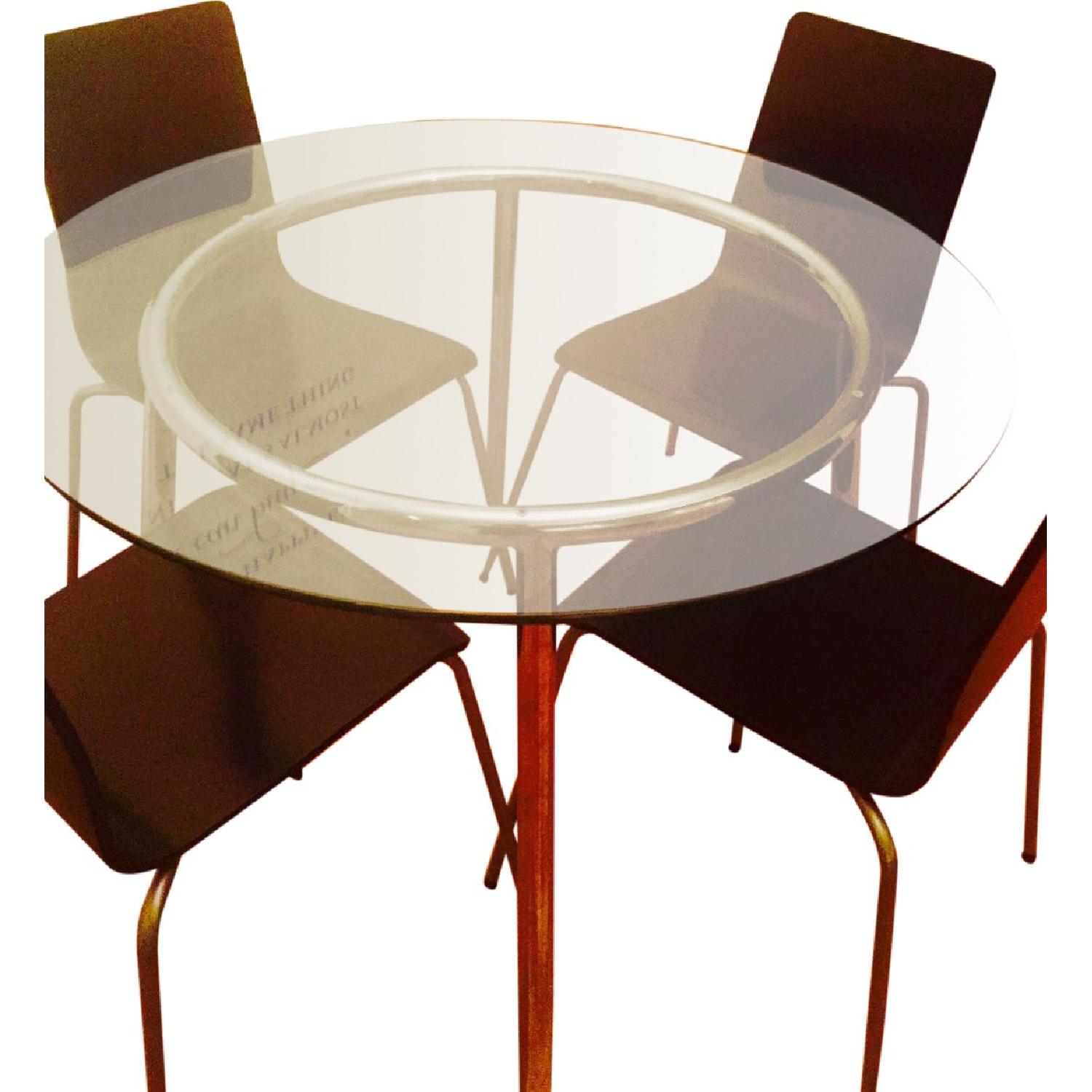 Ikea Glass Dining Round Table w/ 4 Black Chairs AptDeco