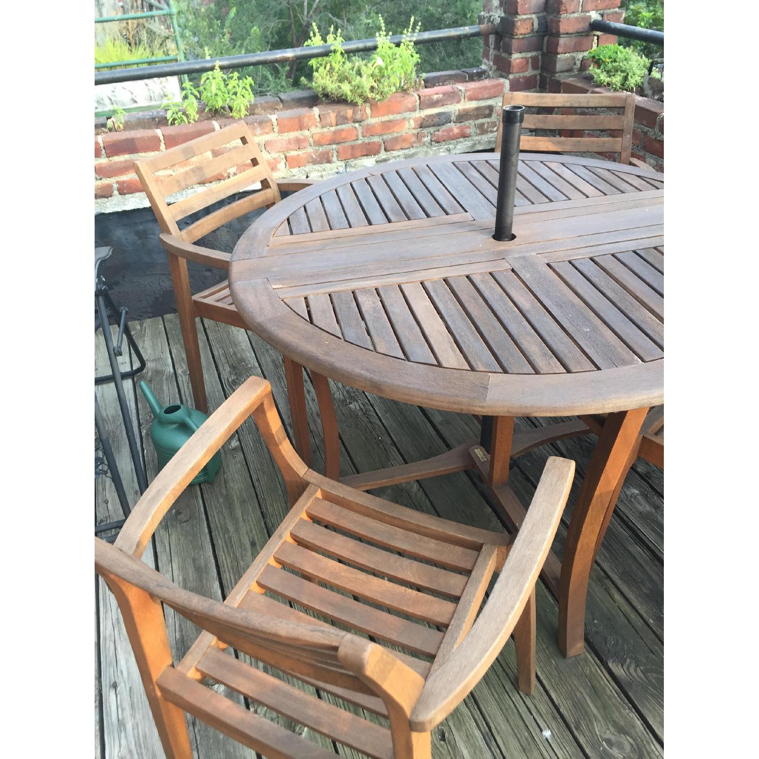 Outdoor Interiors Danish Round Eucalyptus Folding Table w/ 4 Stacking