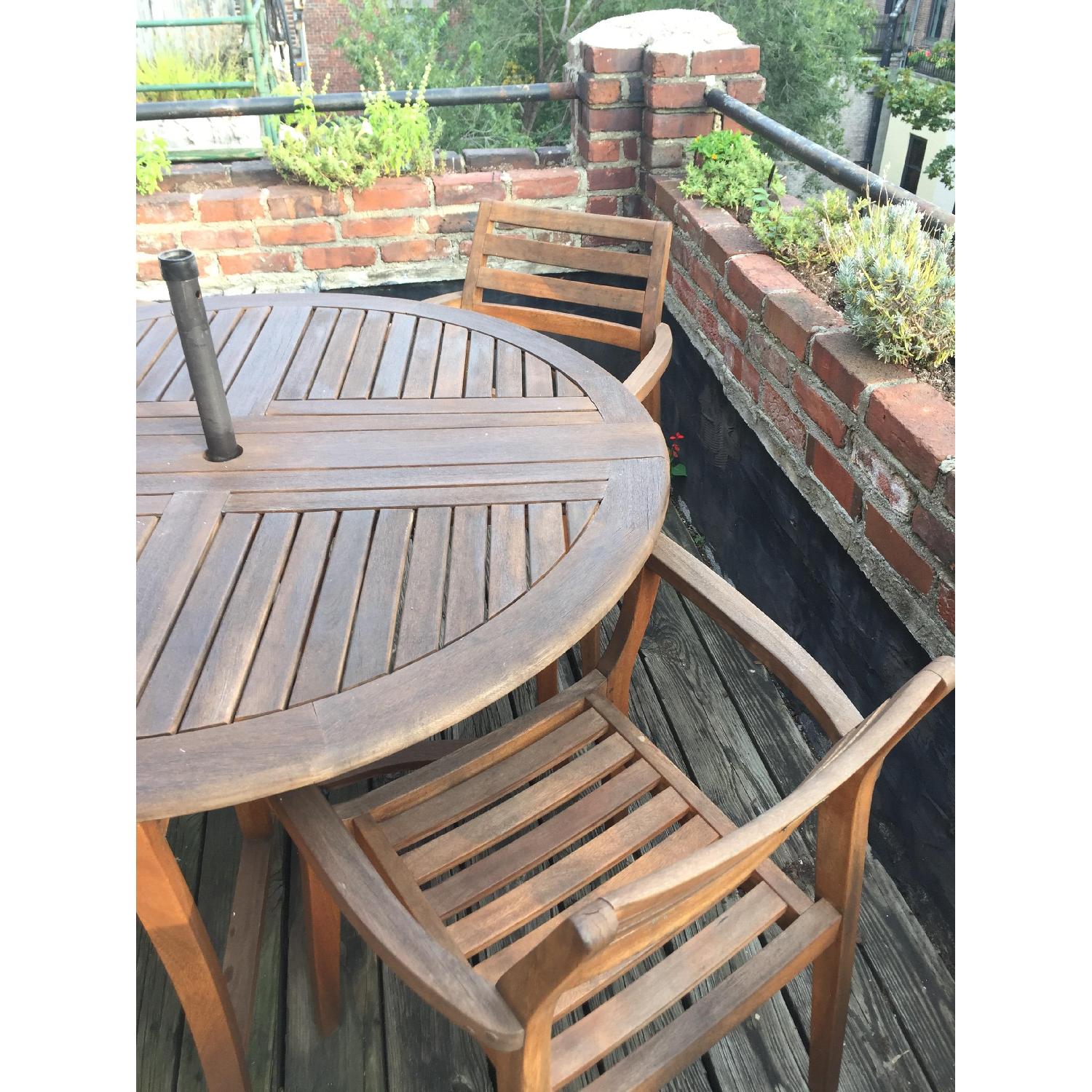 Outdoor Interiors Danish Round Eucalyptus Folding Table w/ 4 Stacking