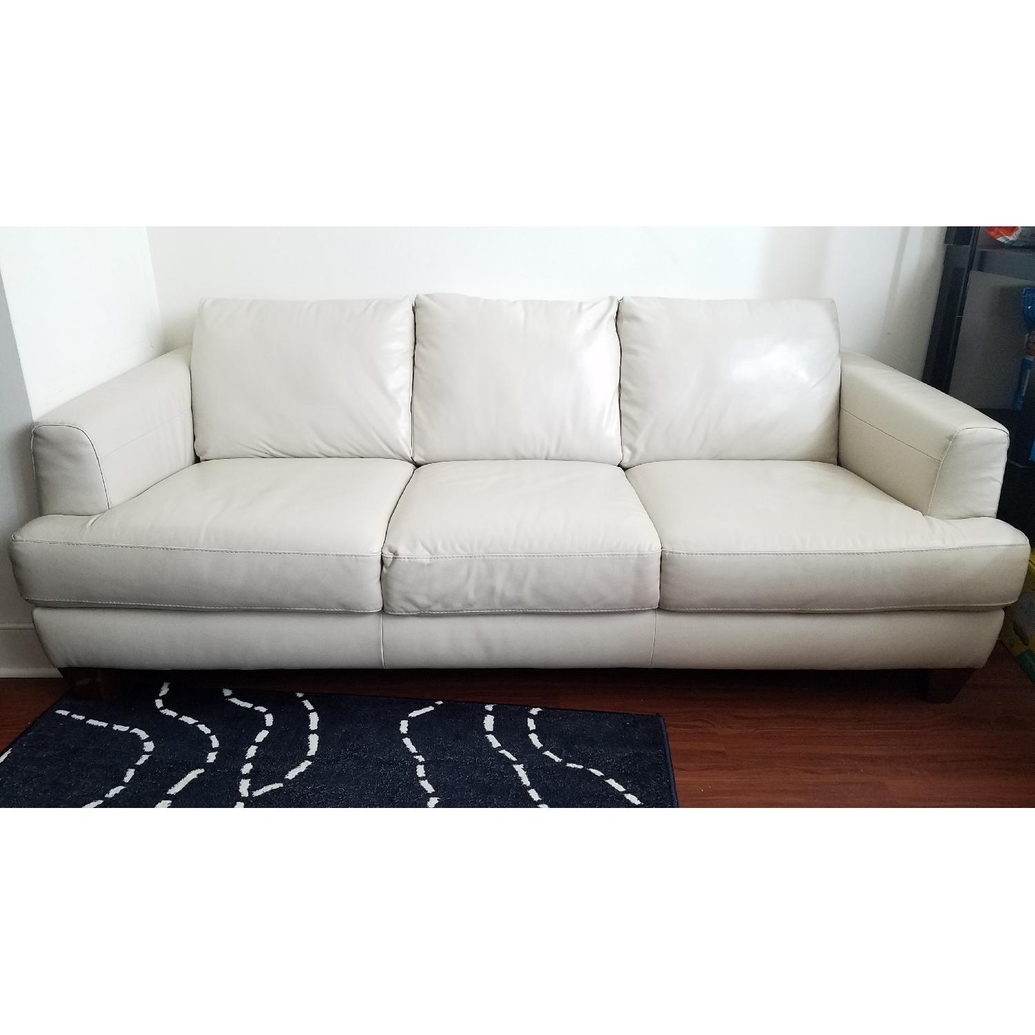 Natuzzi Cream Leather Sofa AptDeco