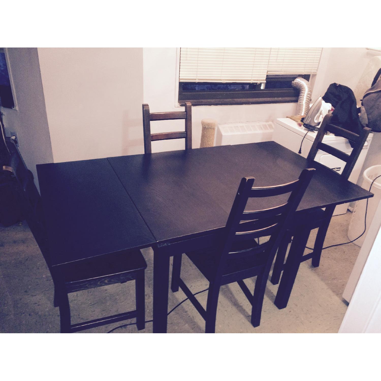 Ikea Bjursta Brown Extendable DiningTable w/ 4 Chairs - AptDeco