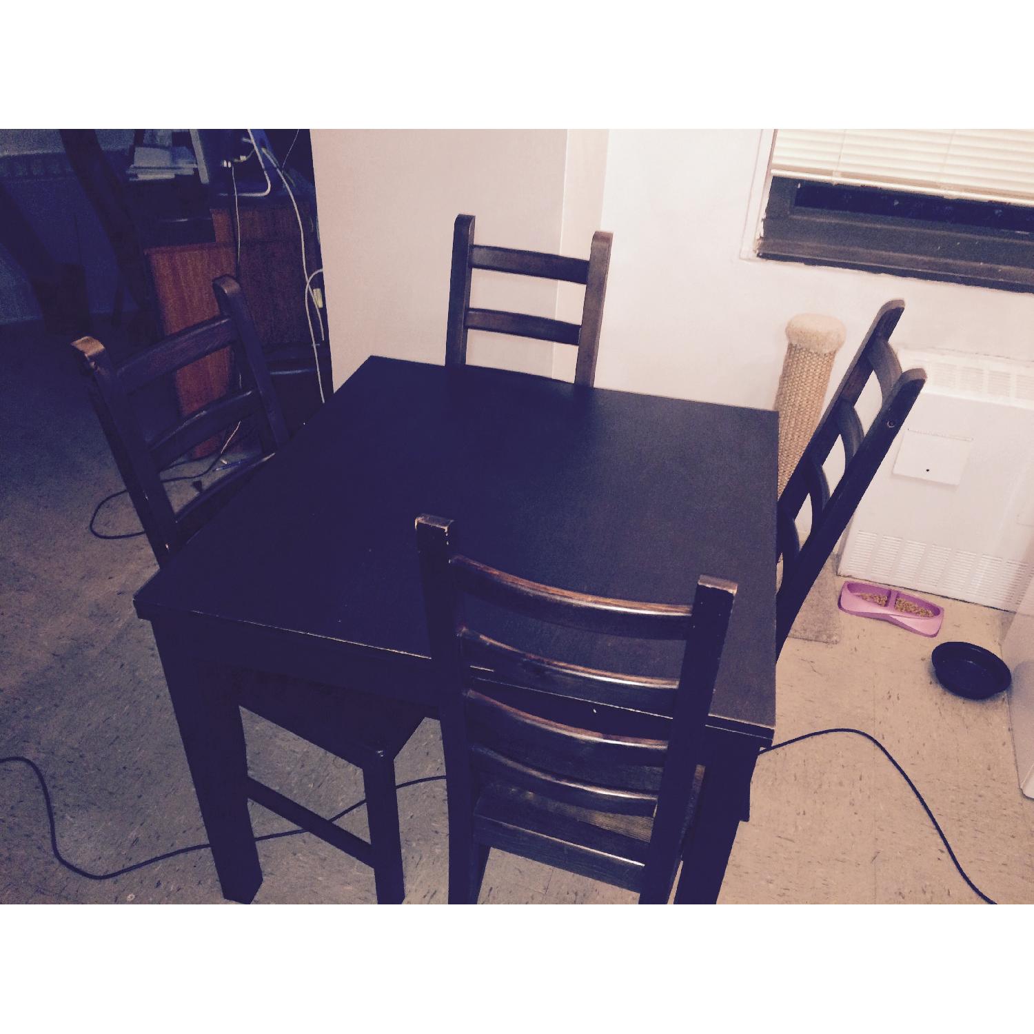 Ikea Bjursta Brown Extendable DiningTable w/ 4 Chairs - AptDeco