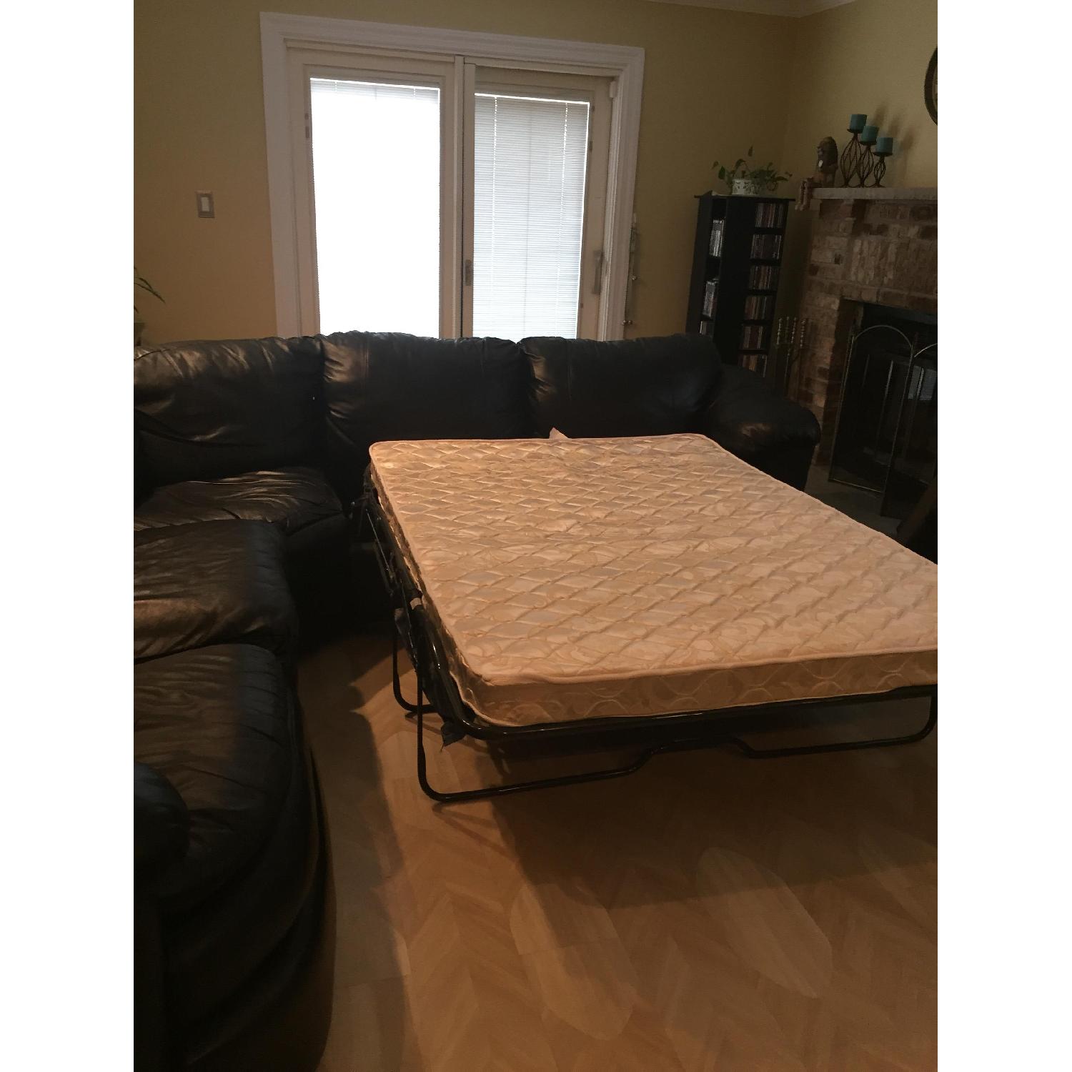 Black Leather Sectional w/ Full Size Pull Out Bed - image-2