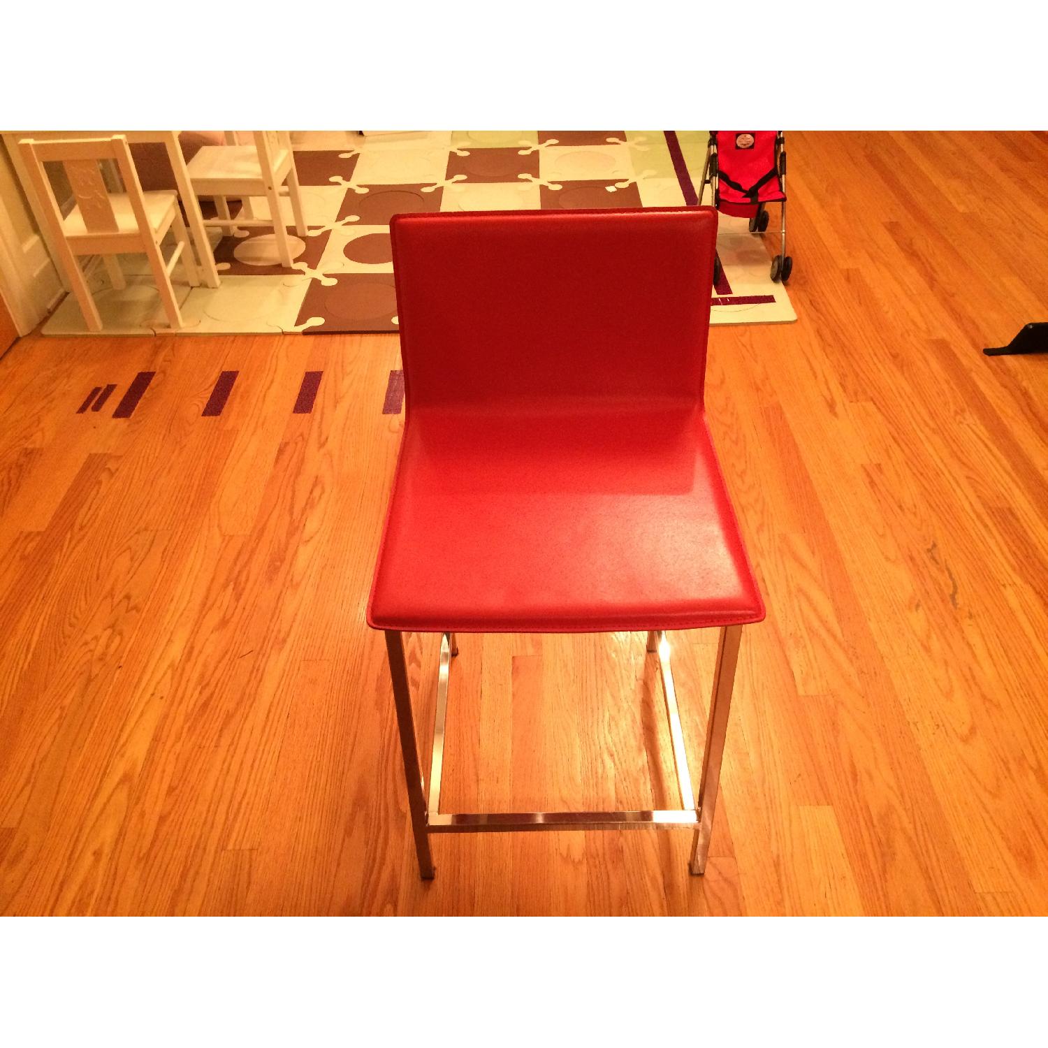 CB2 Orange Leather Bar Stools - image-1