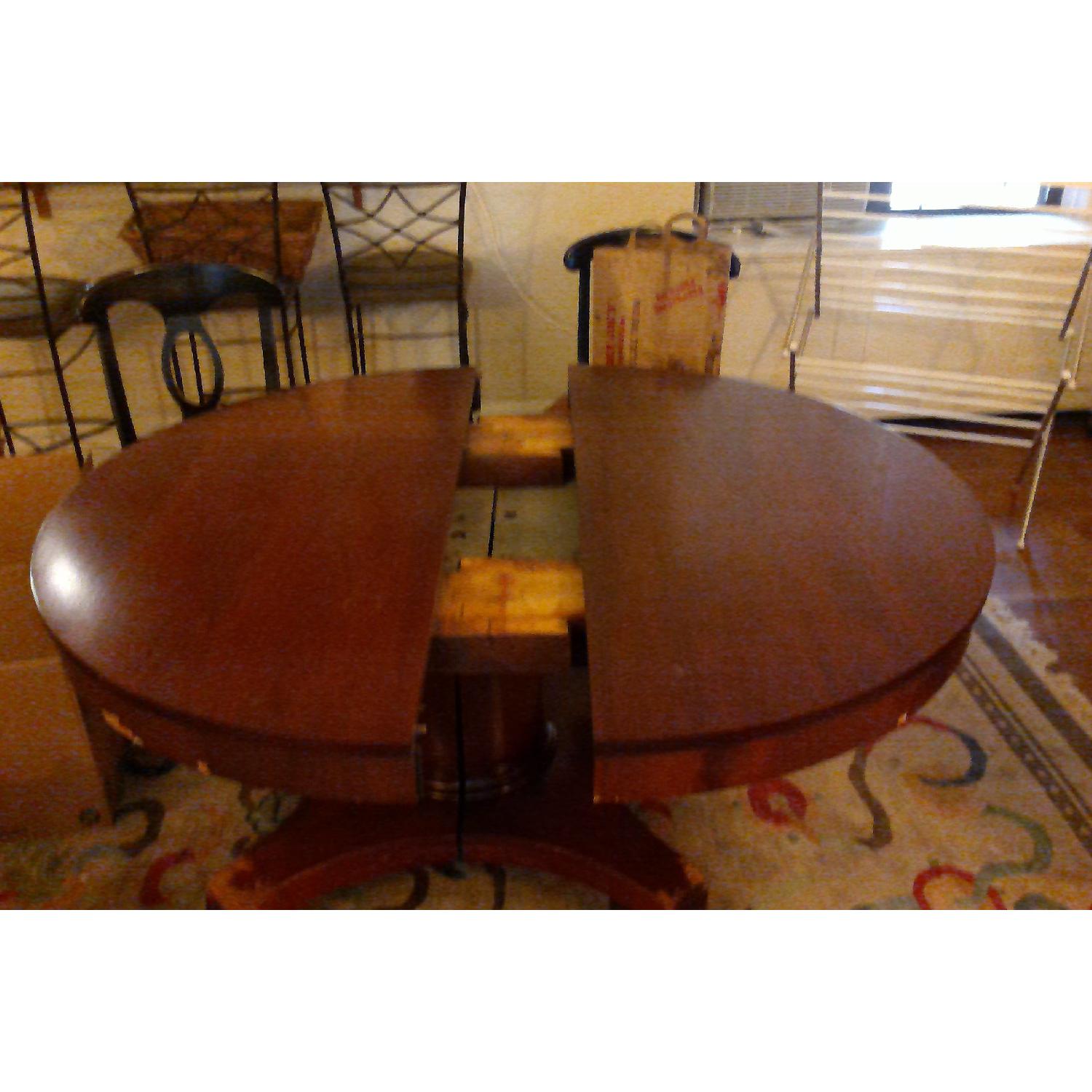 Antique Expandable Round Dining Table AptDeco