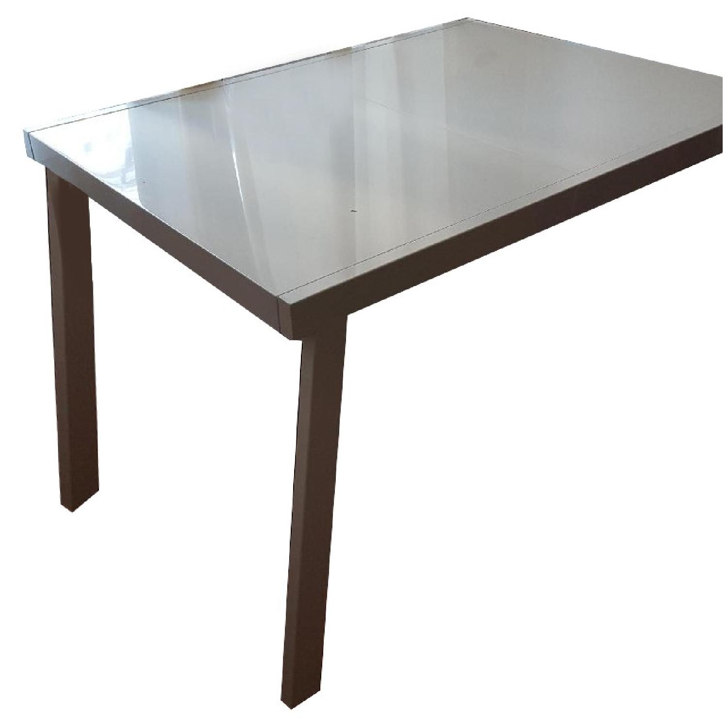 CB2 Pocket White Extension Dining Table AptDeco