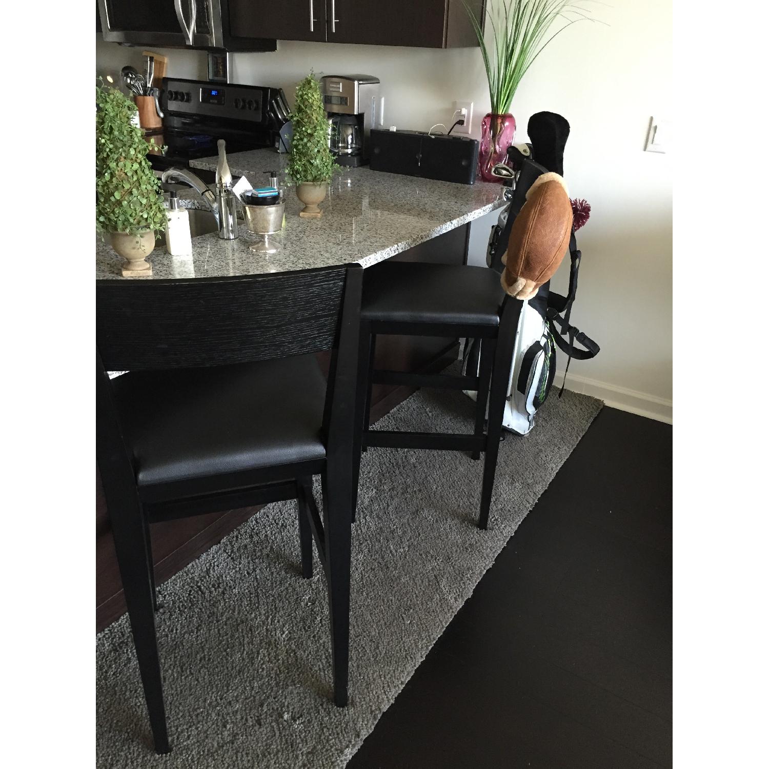 Crate & Barrel Black Leather Bar Stools Pair AptDeco