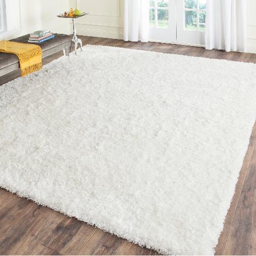 Used Safavieh Handmade Malibu Shag White Polyester Area Rug for sale on AptDeco