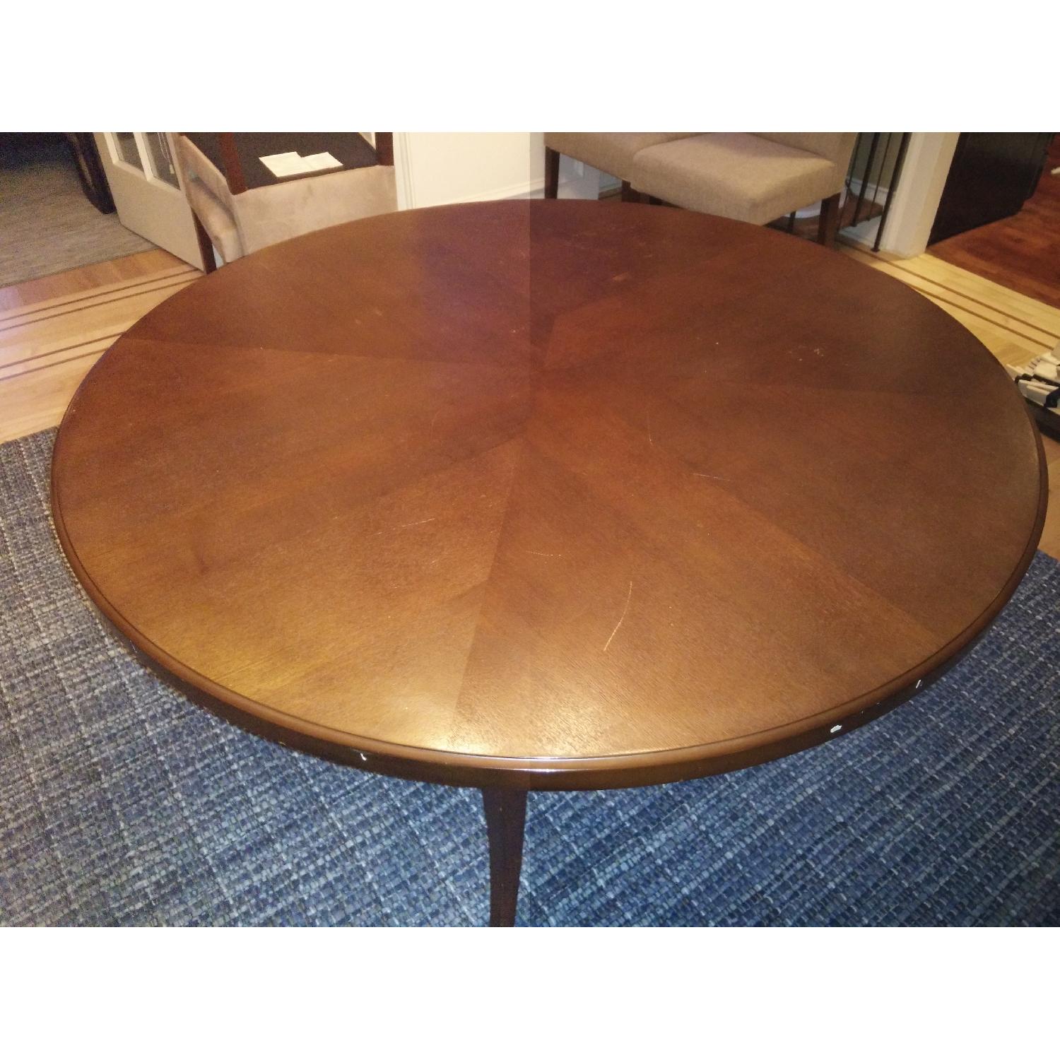 Crate & Barrel Round Dining Table in Espresso AptDeco