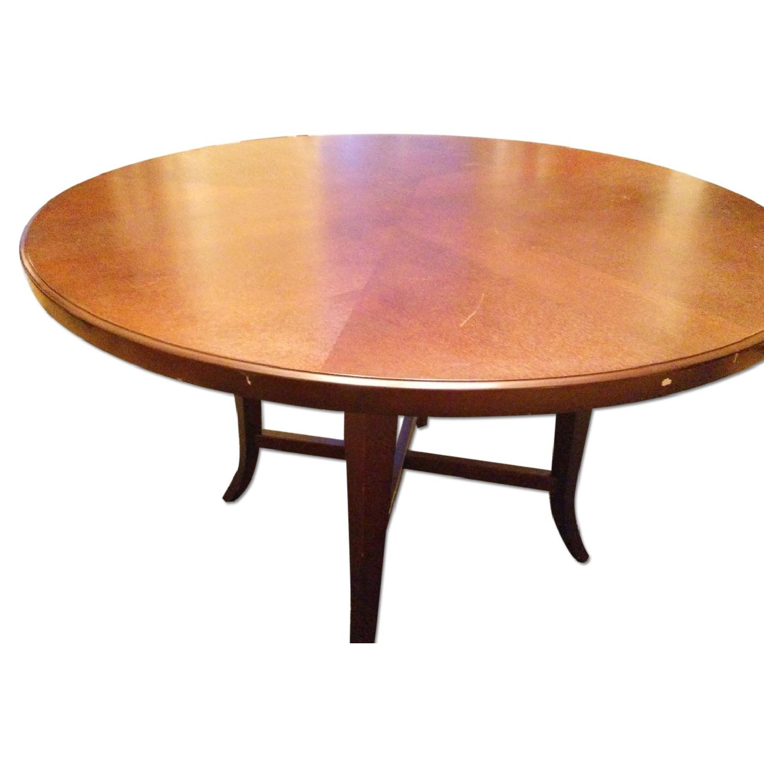 Crate & Barrel Round Dining Table in Espresso AptDeco