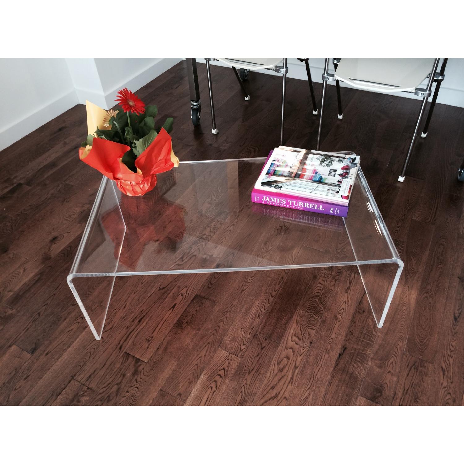 CB2 Acrylic Coffee Table AptDeco