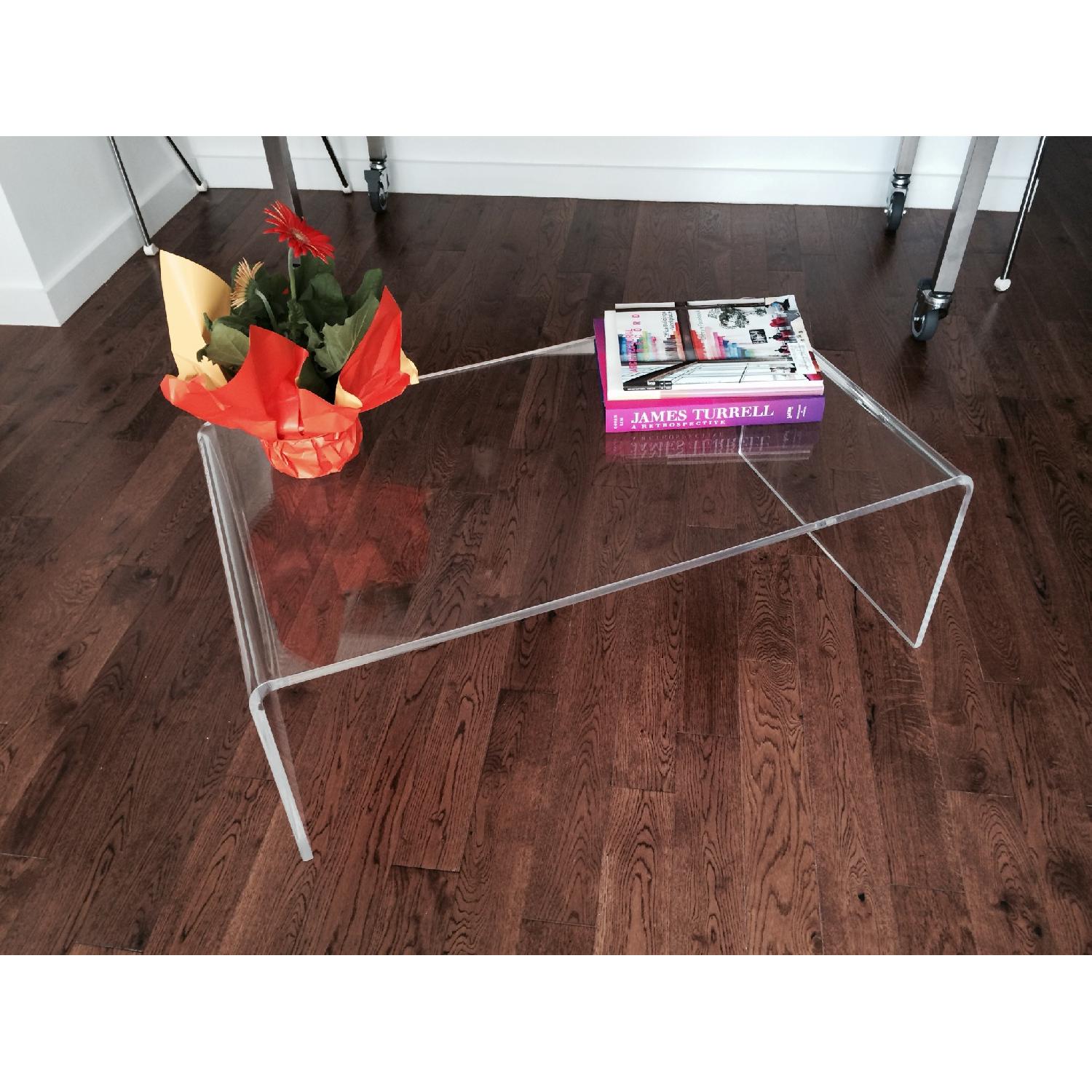 CB2 Acrylic Coffee Table AptDeco