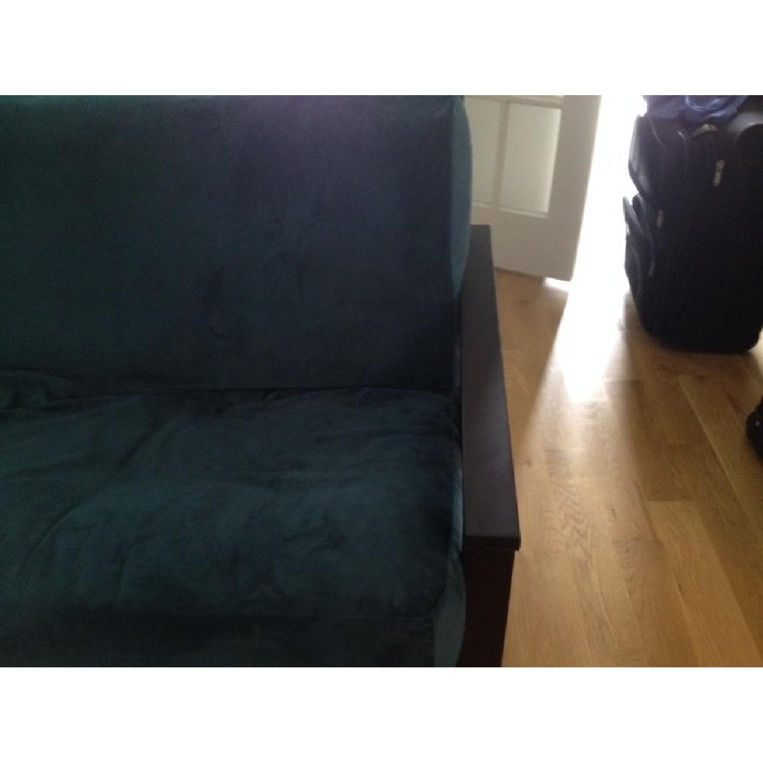 Futon Land Crushed Blue Velvet Futon AptDeco