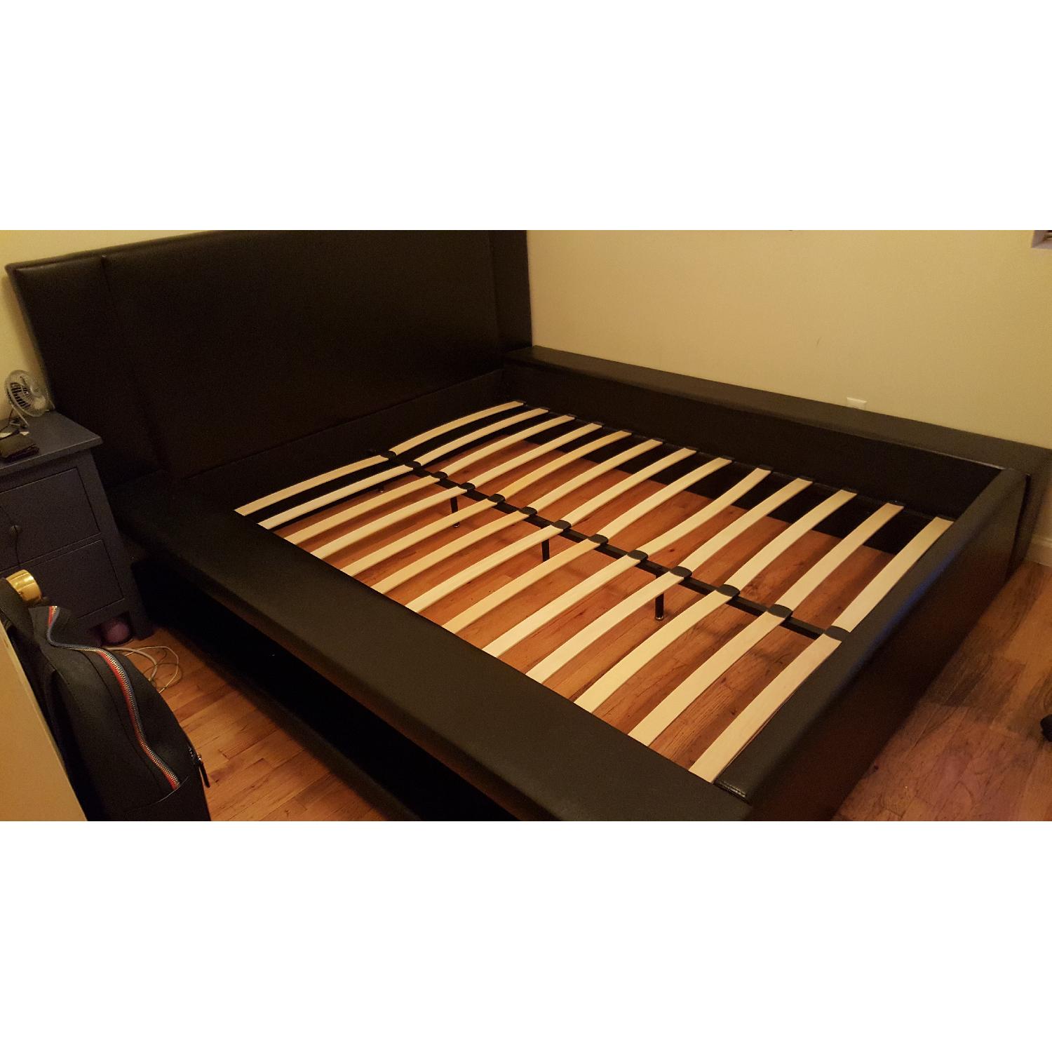 Anabella Black Bonded Leather Queen Bed Frame AptDeco