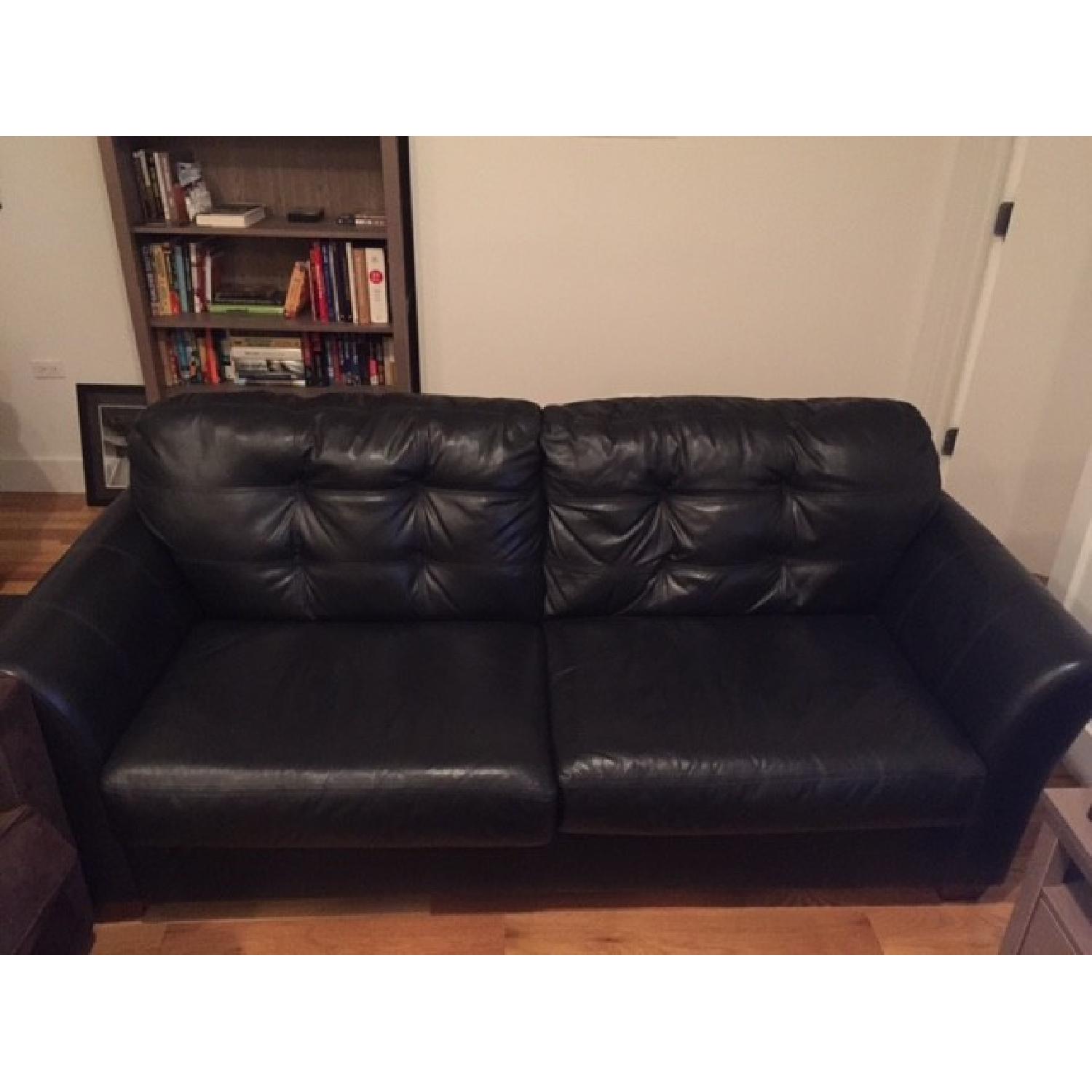 Ashley's Black Leather Couch - image-1