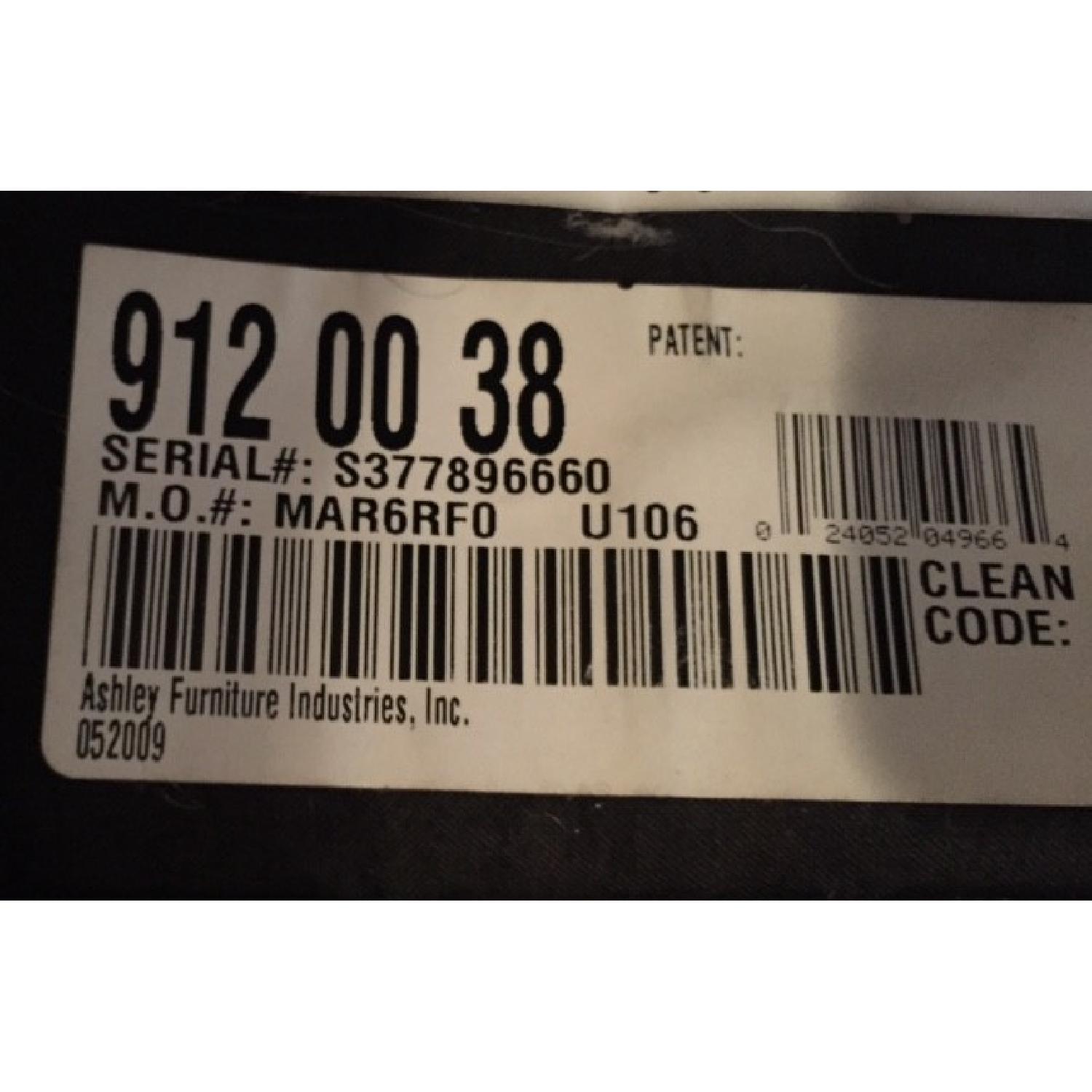 Ashley's Black Leather Couch - image-3