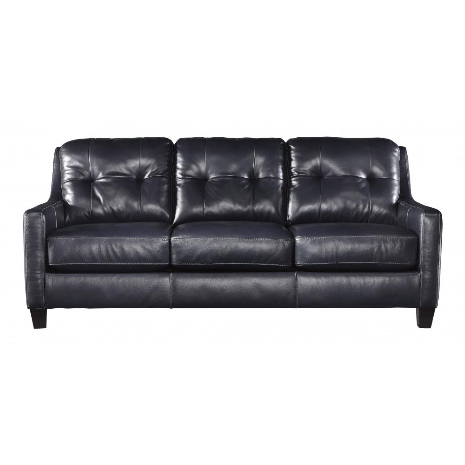 Ashley's O'Kean Sleeper Sofa in Navy - image-0