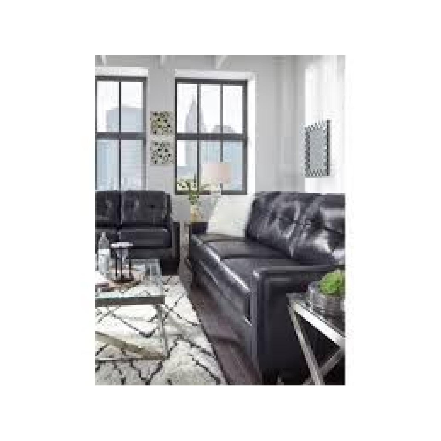 Ashley's O'Kean Sleeper Sofa in Navy - image-4