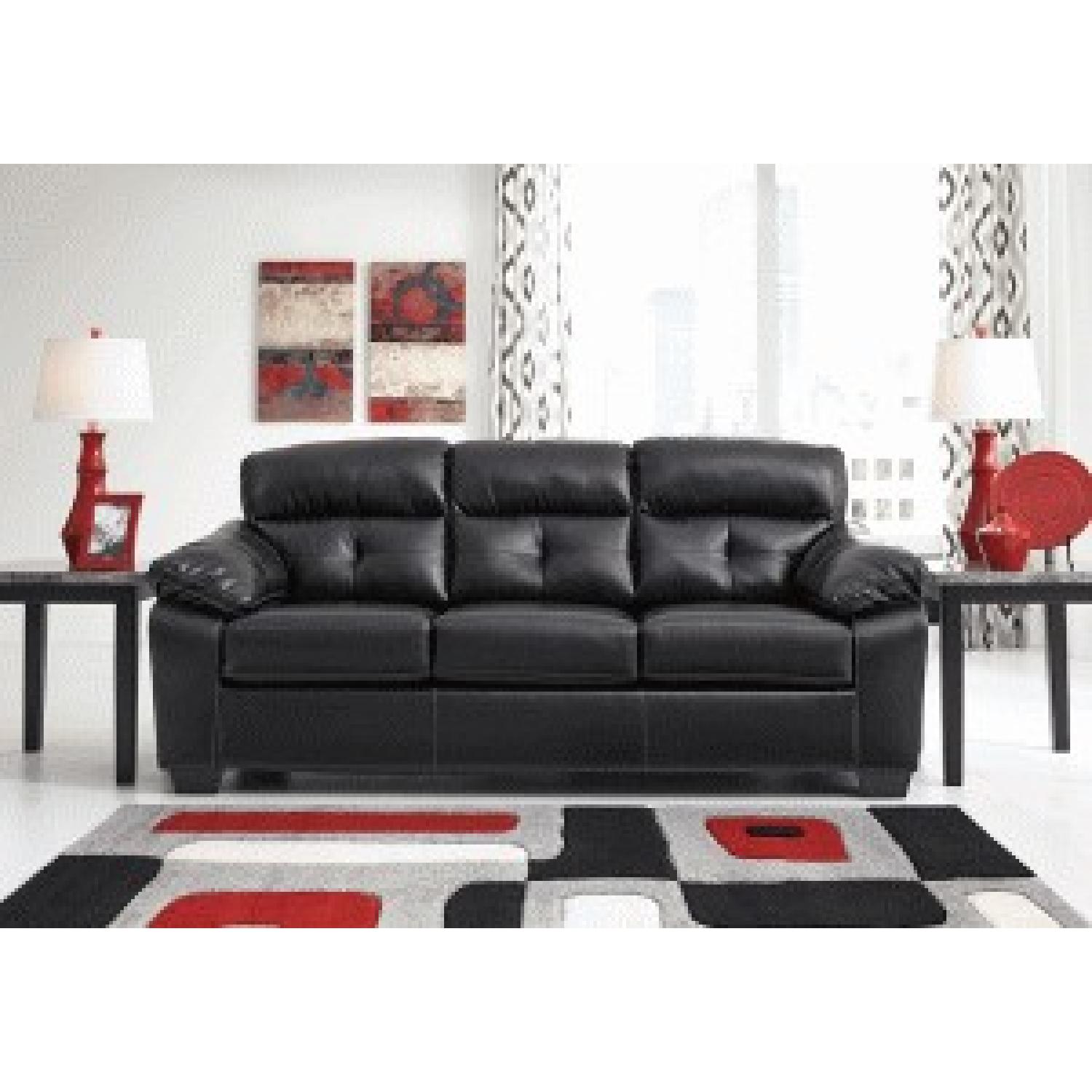 Ashley's Commando Sleeper Sofa in Black AptDeco