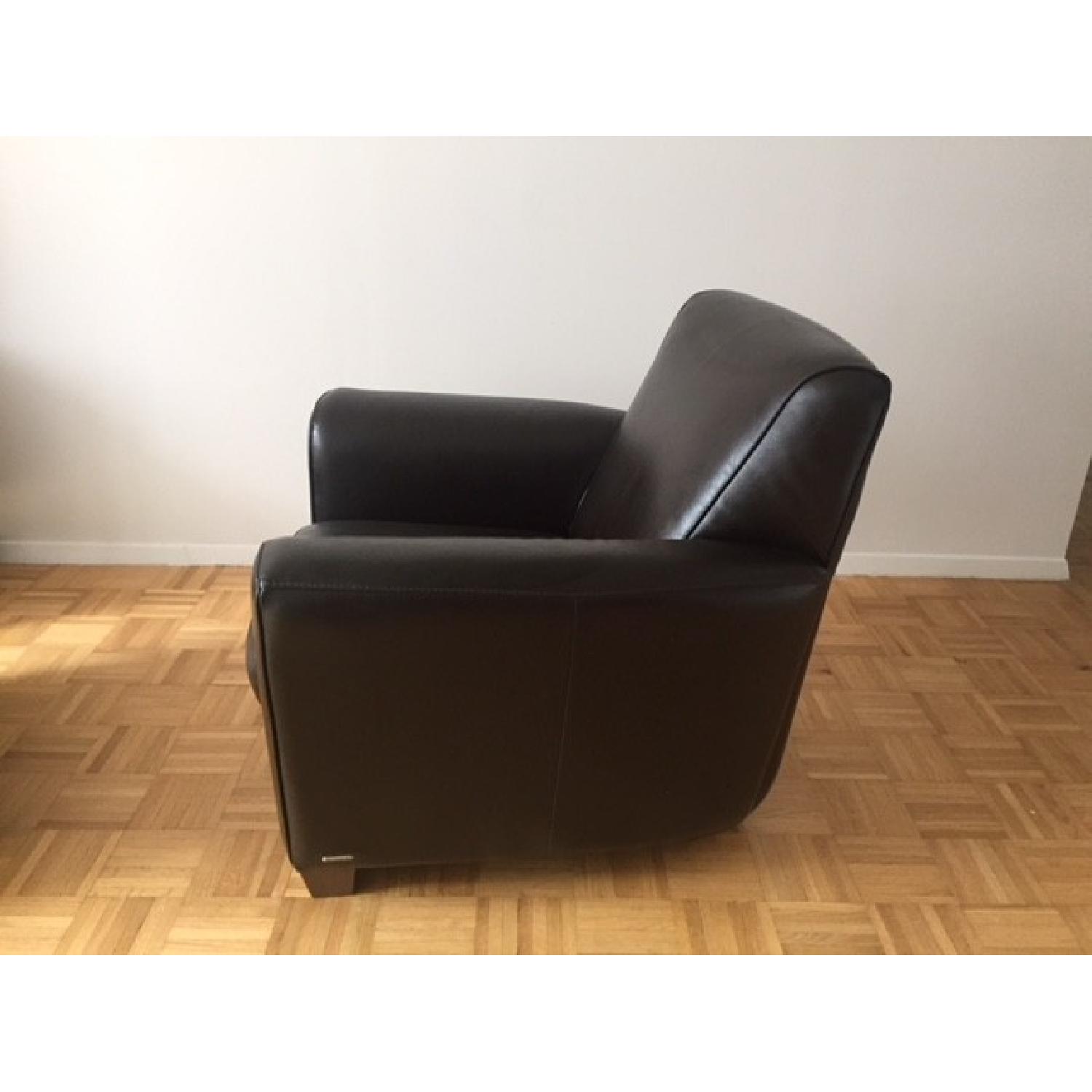 Natuzzi Leather Arm Chair & Ottoman - AptDeco