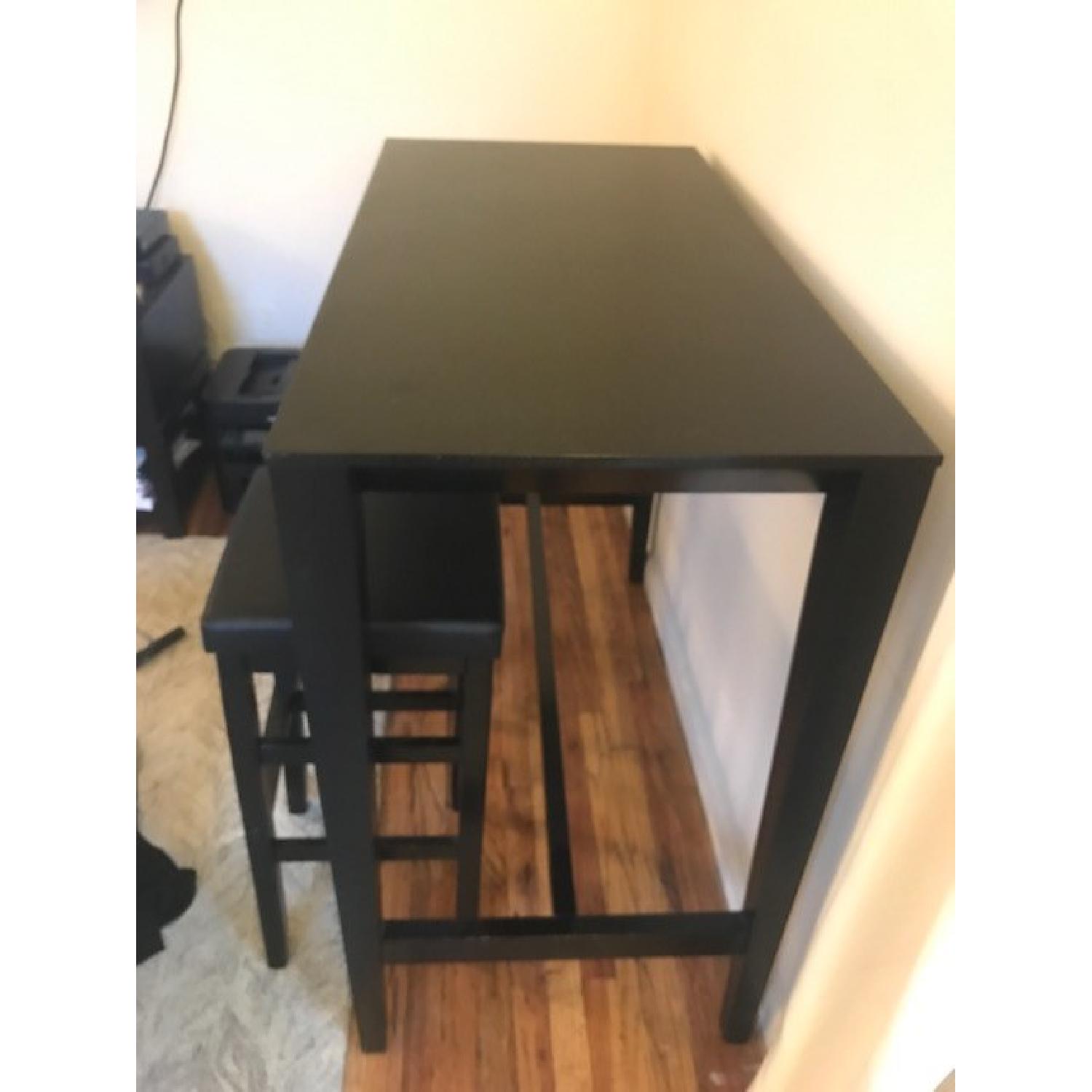 crate-barrel-parsons-wood-high-dining-table-aptdeco