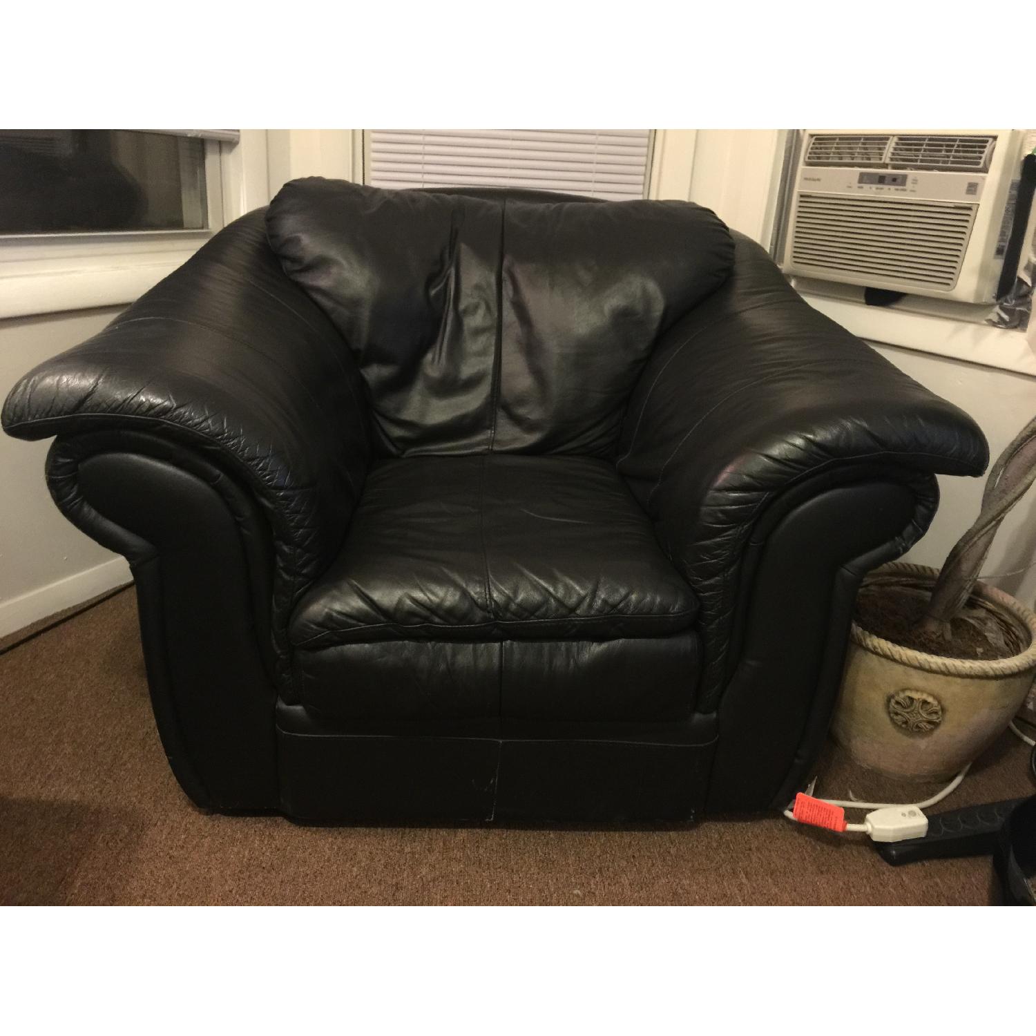 Bob's Black Leather Armchair w/ Ottoman - image-1