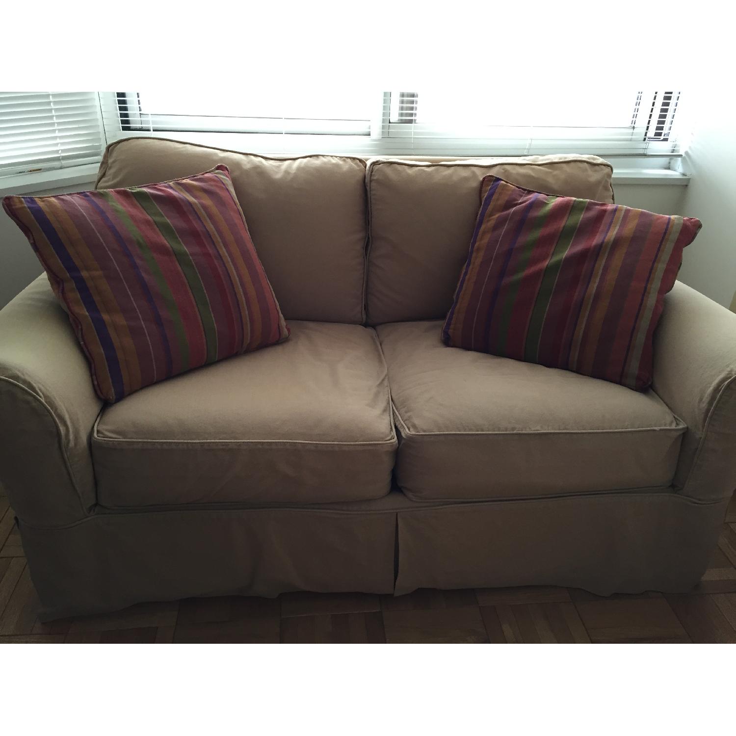 Cindy Crawford Collection Slipcovered Loveseat w/ 4 Throw Pillows AptDeco