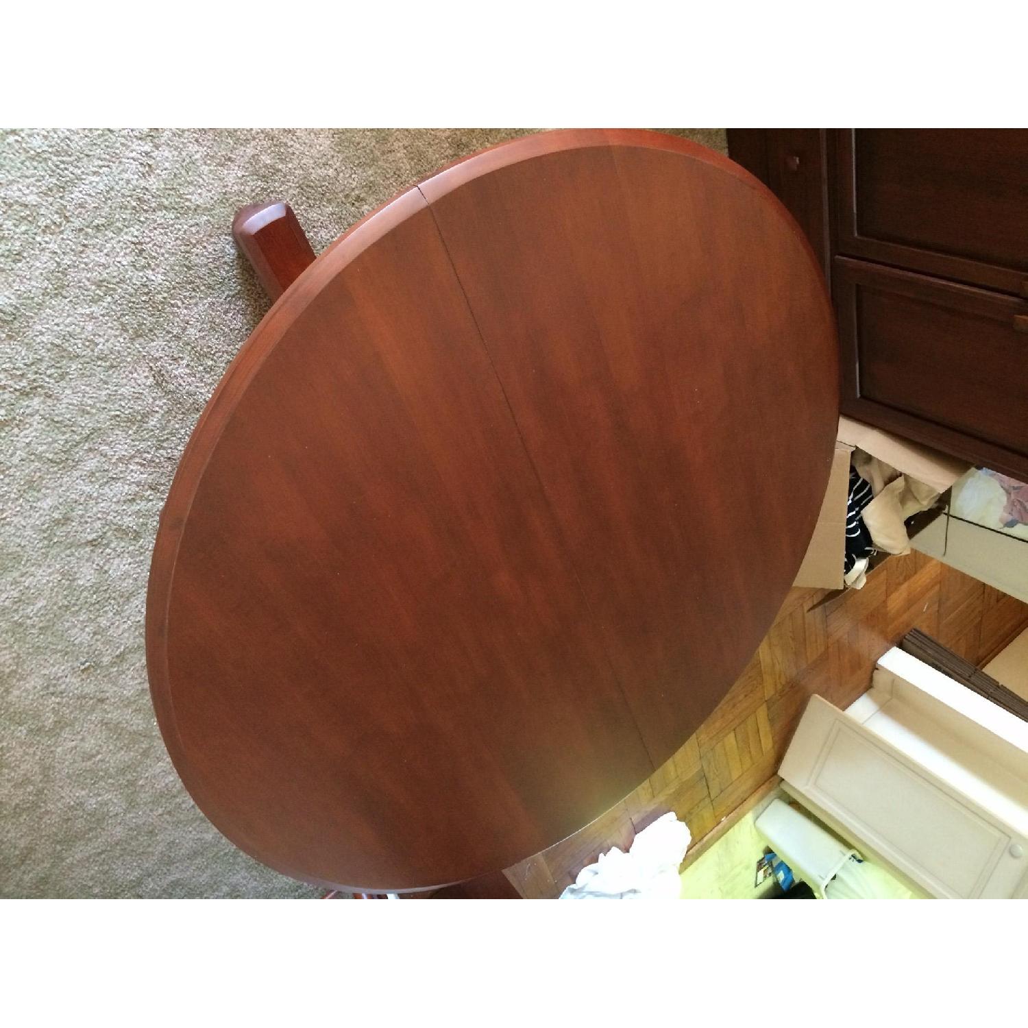 Ethan Allen Round Walnut Dining Room Table with Leaves - image-3