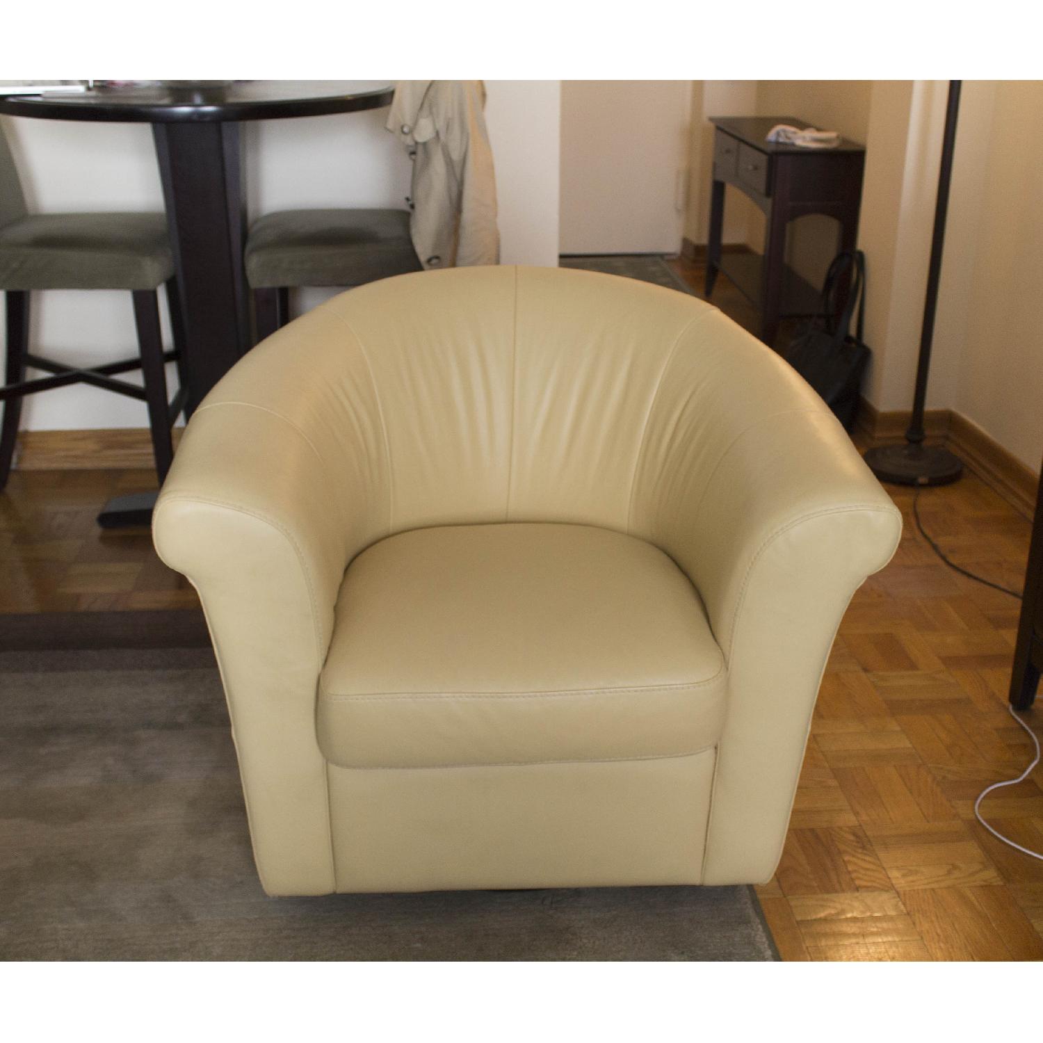 Macy's Yellow Leather Swivel Accent Chair AptDeco