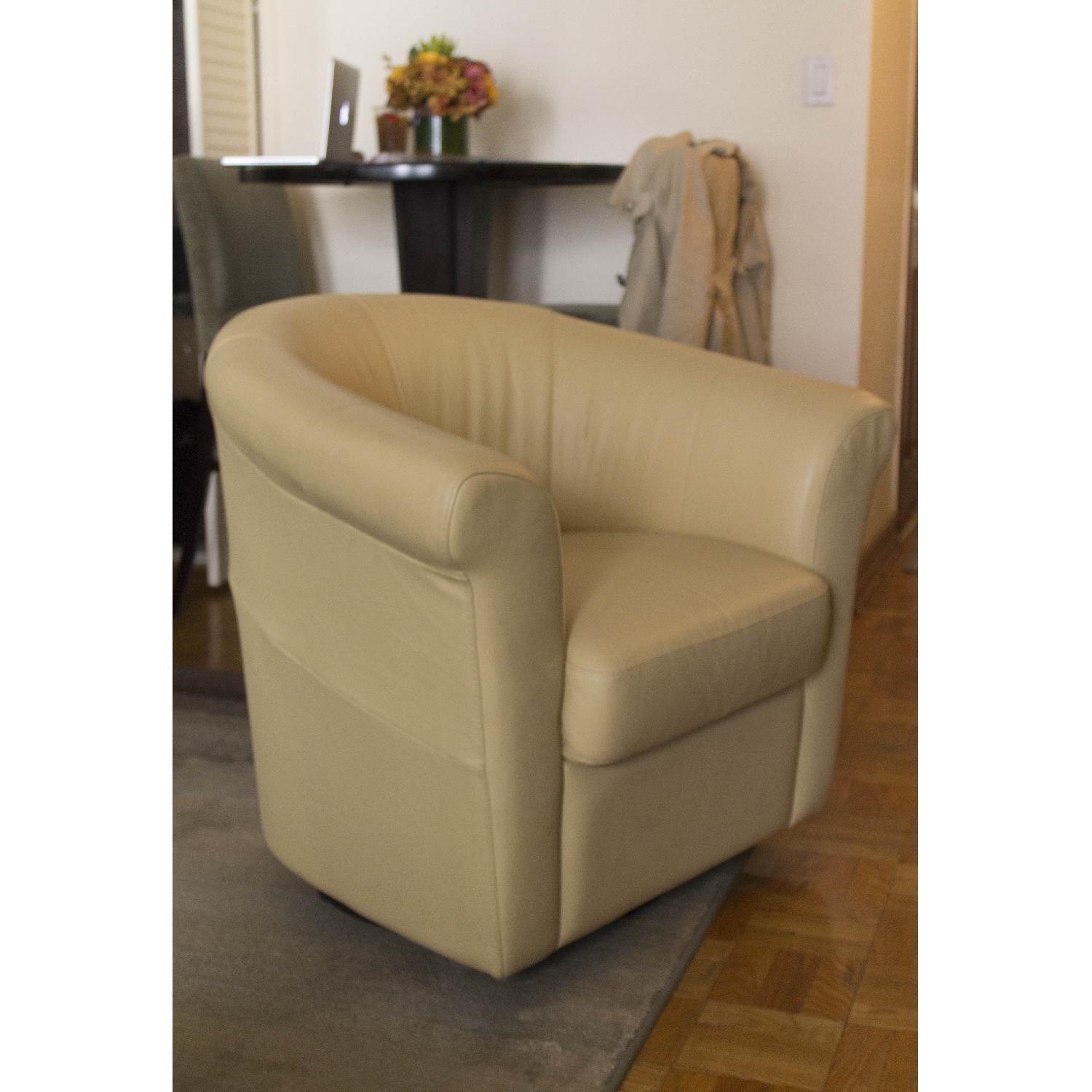 Macy's Yellow Leather Swivel Accent Chair AptDeco