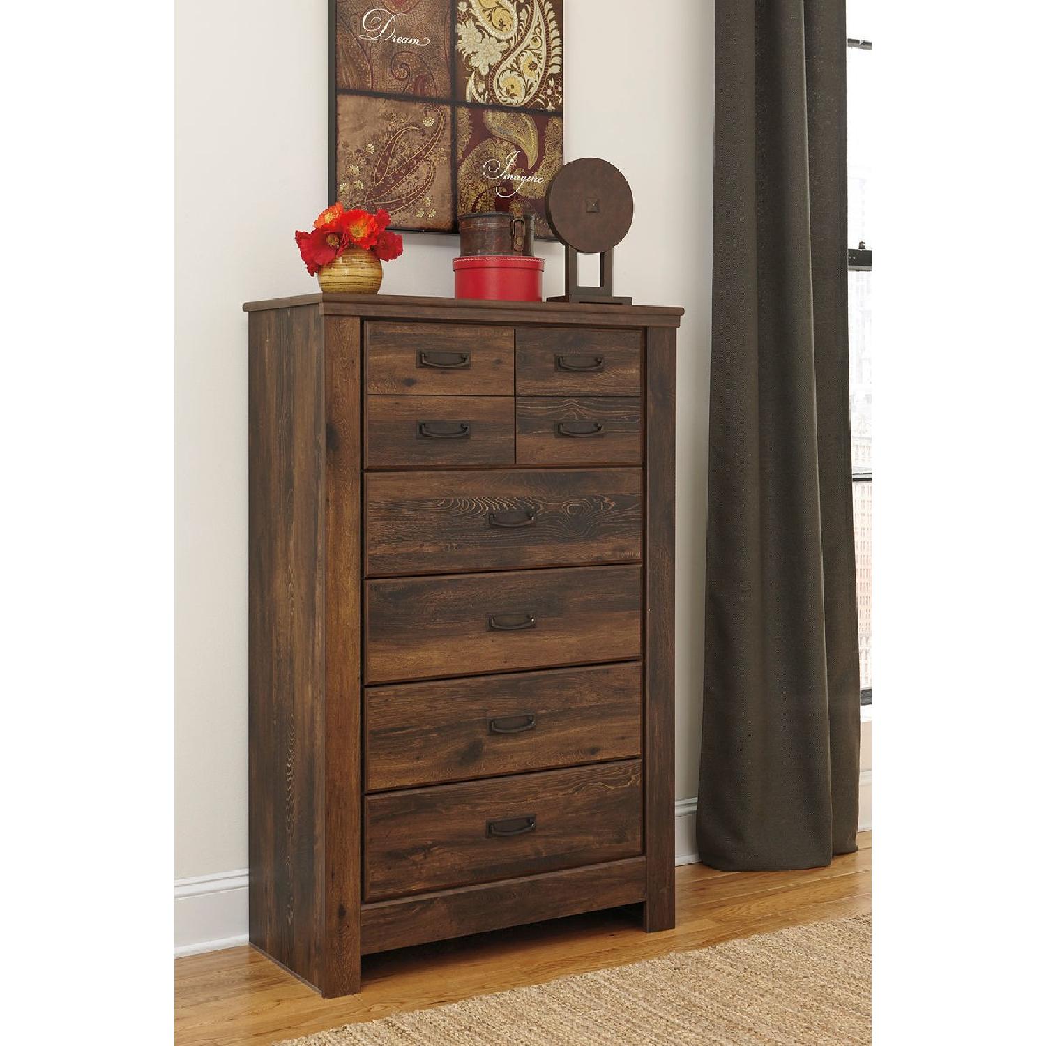 Ashley's Quiden Five Drawer Chest in Dark Brown - image-1