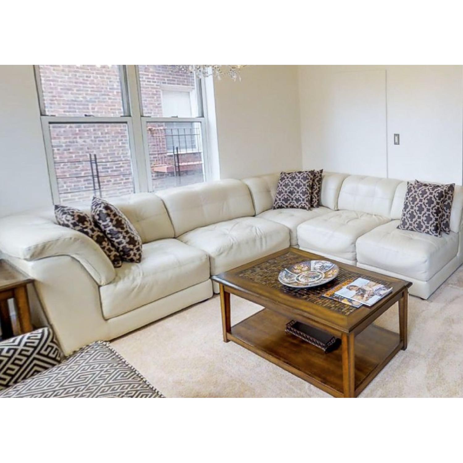 Raymour & Flanigan 5 Piece Leather Sectional Sofa - AptDeco