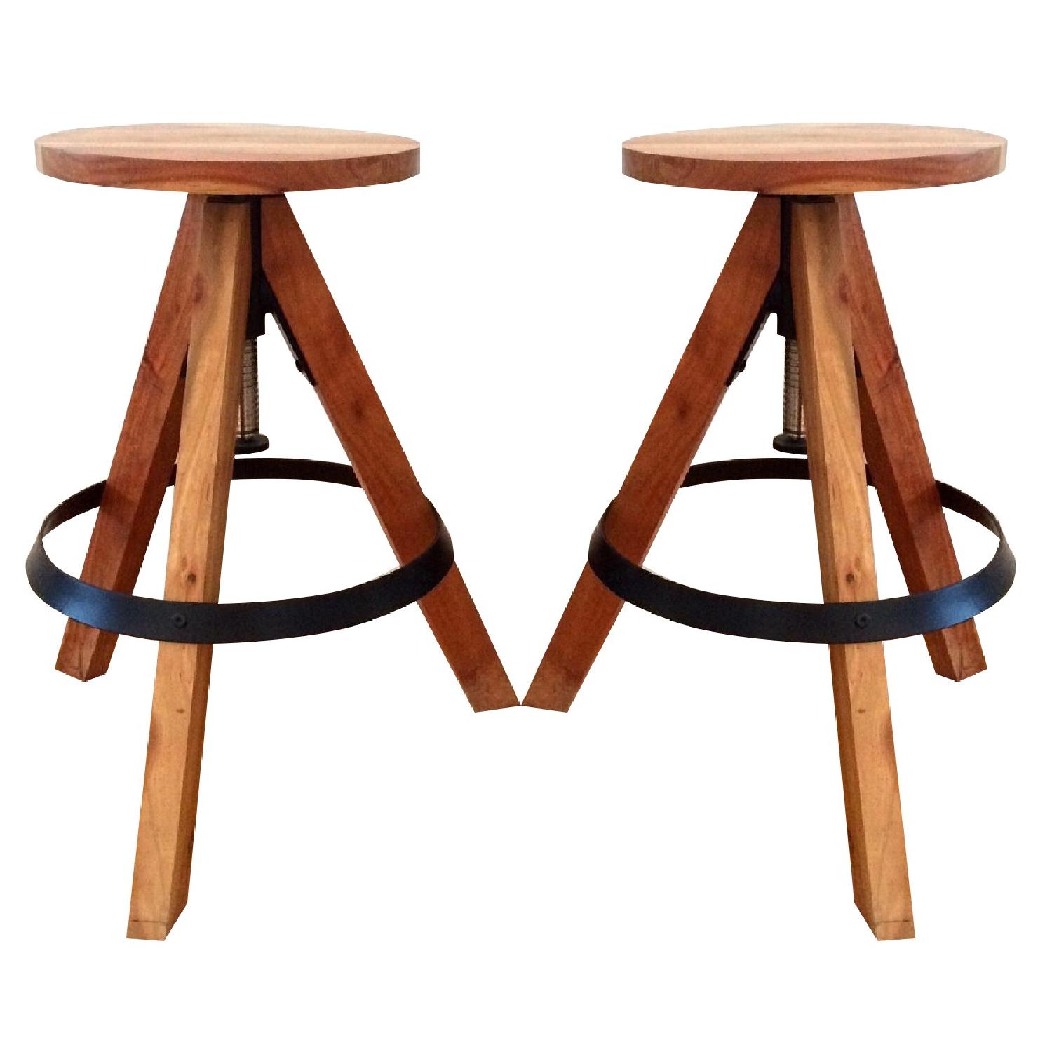 CB2 Rig Acacia Adjustable Bar Stools AptDeco