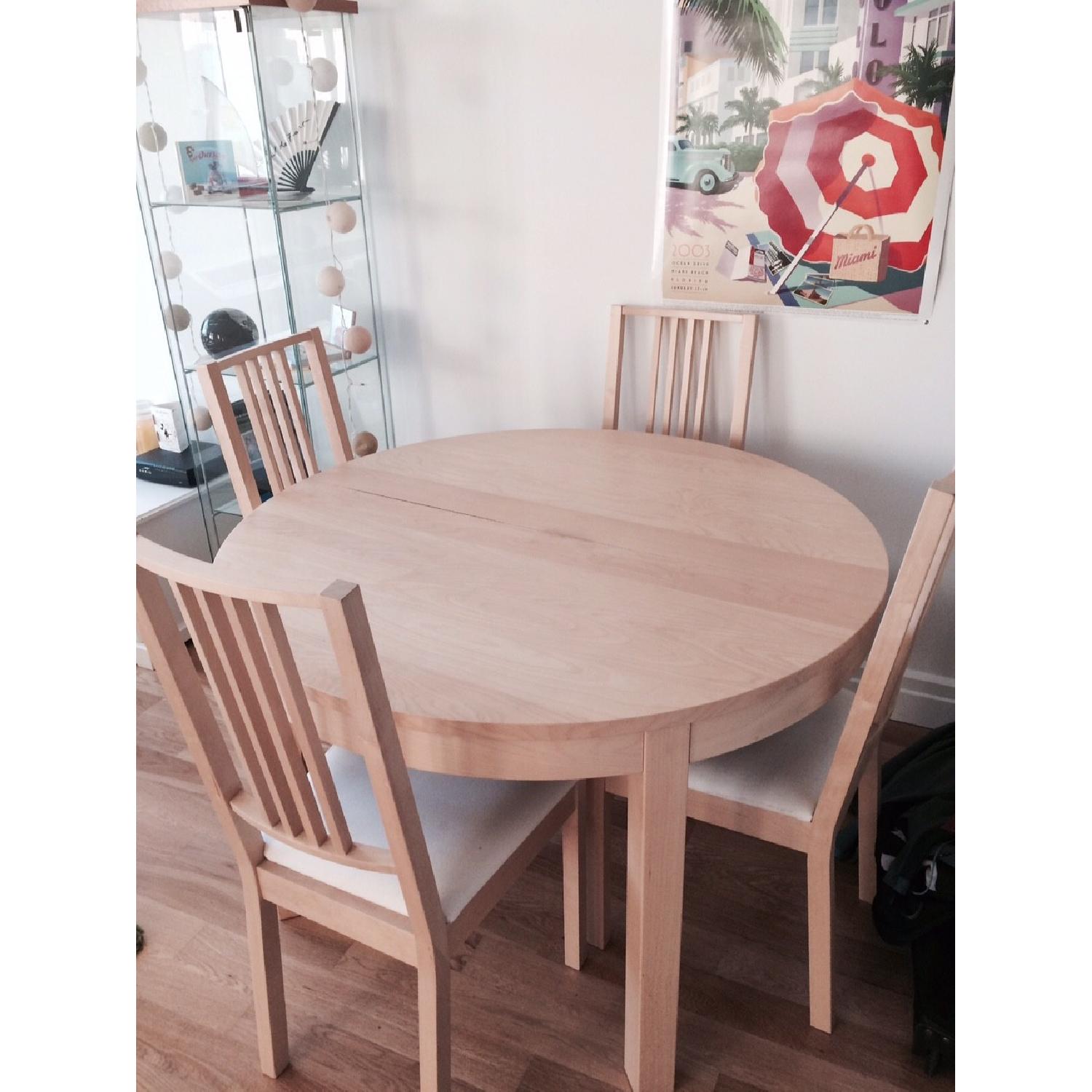 Ikea Bjursta Expandable Table w/ 4 Chairs - AptDeco