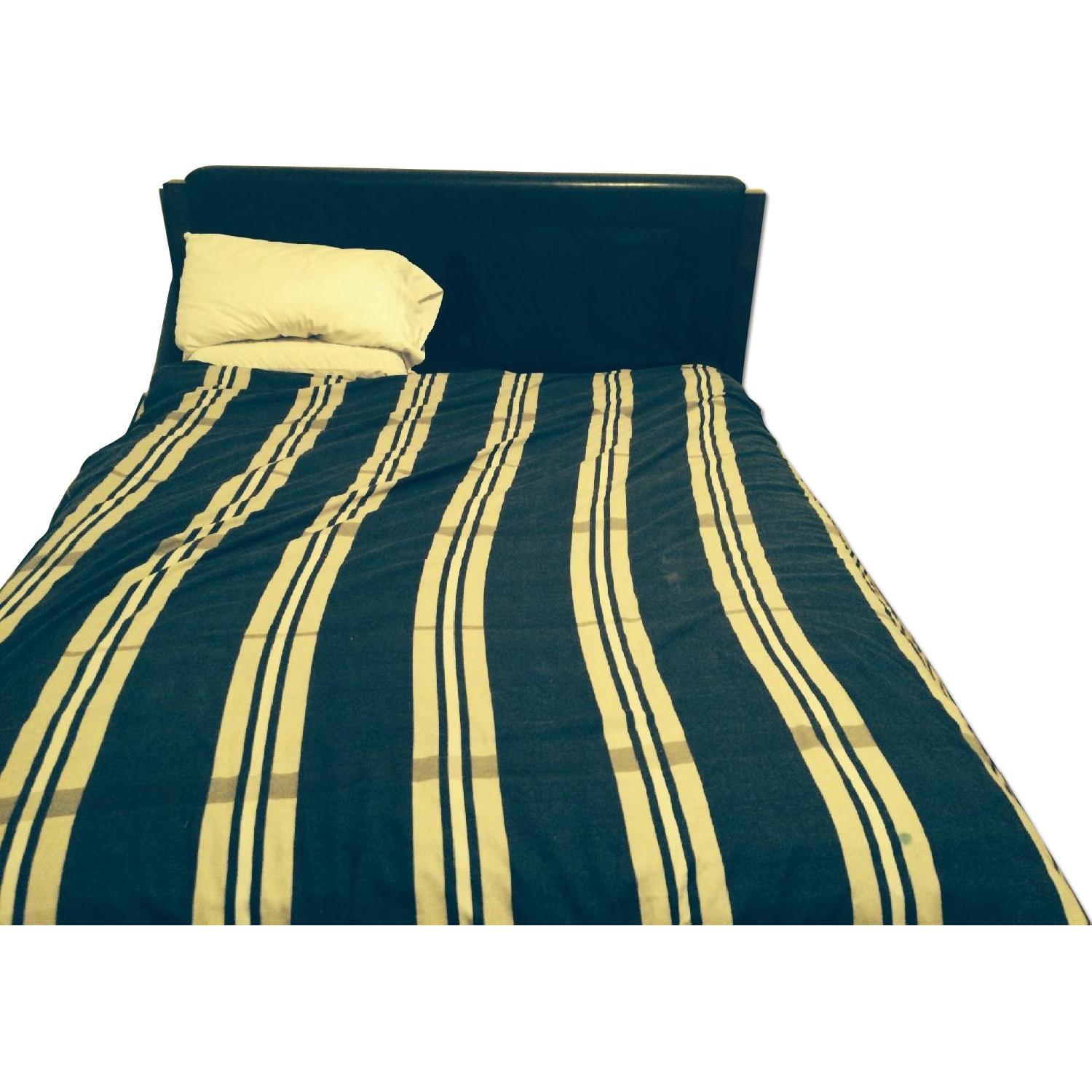 Ashley Furniture Wooden Bed Frame - image-0