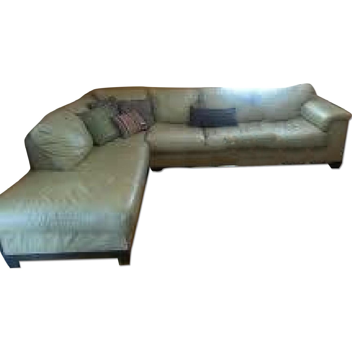 Jennifer Convertible Leather Sectional Sofa Bed AptDeco