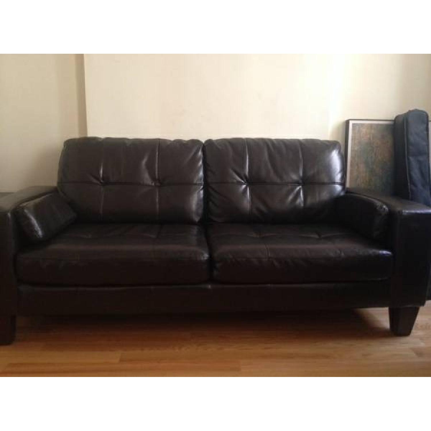 Jennifer Convertibles Leather Sofa - image-1