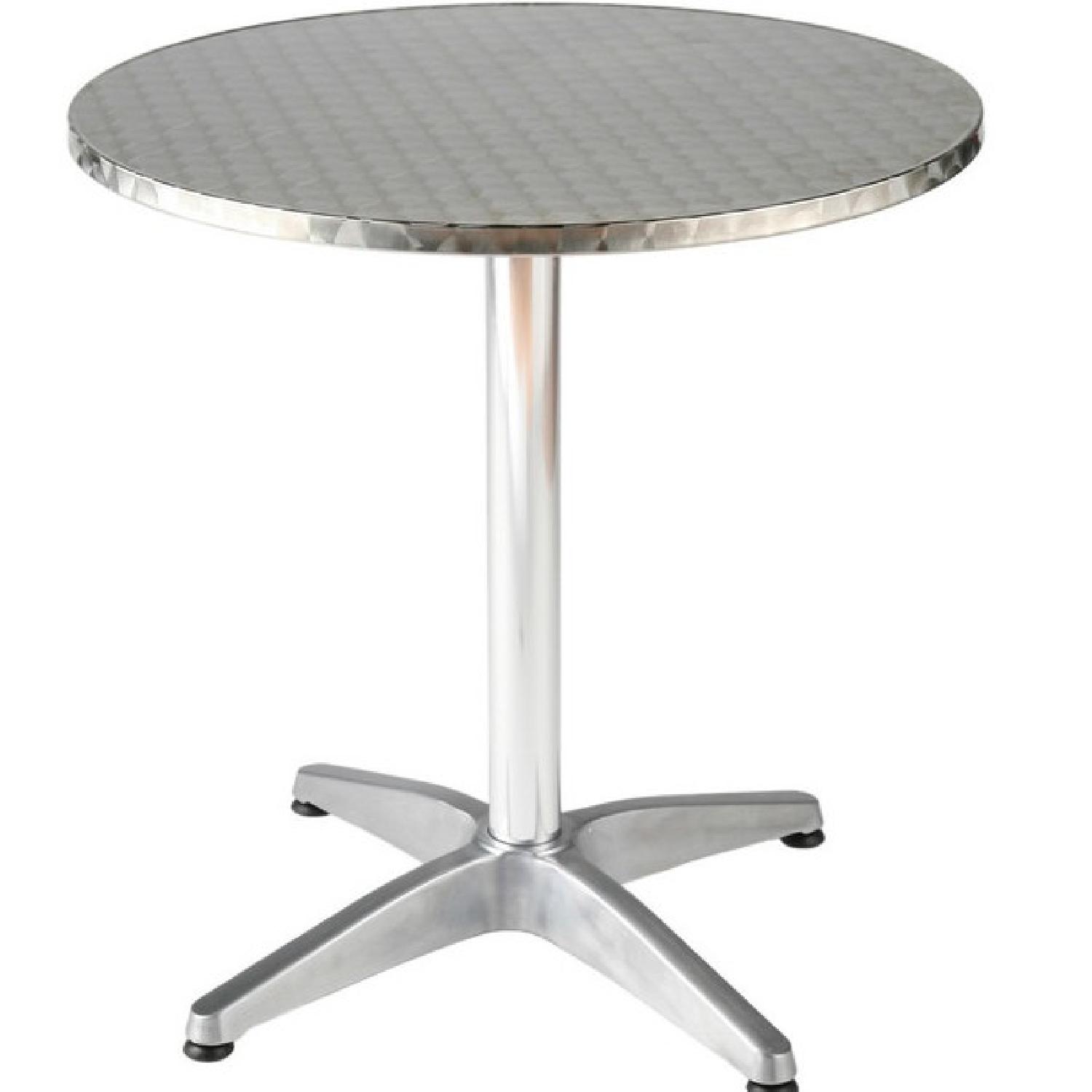 Round Outdoor Metal Table - AptDeco