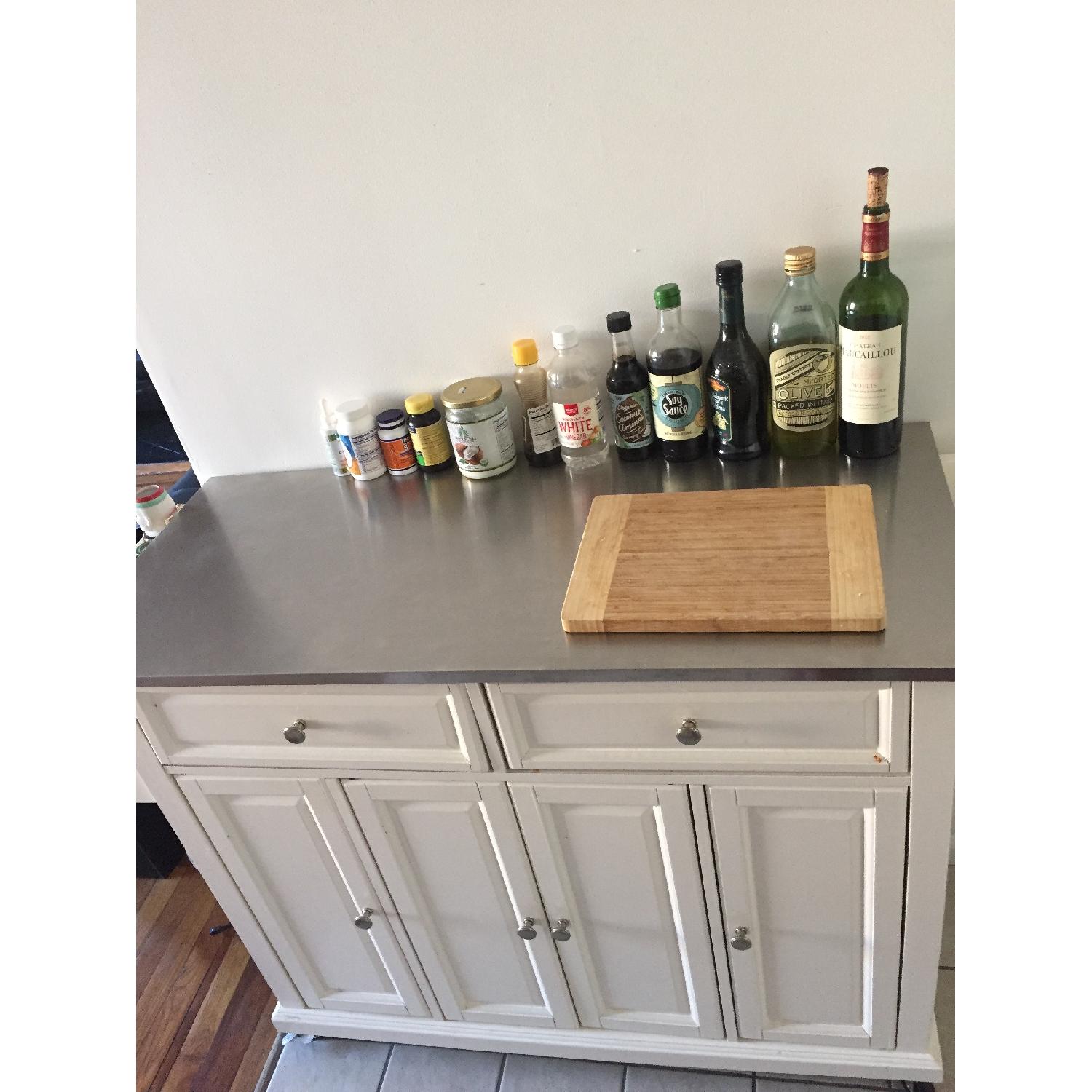 Crosley Rolling Kitchen Cart w/ Stainless Steel Top AptDeco