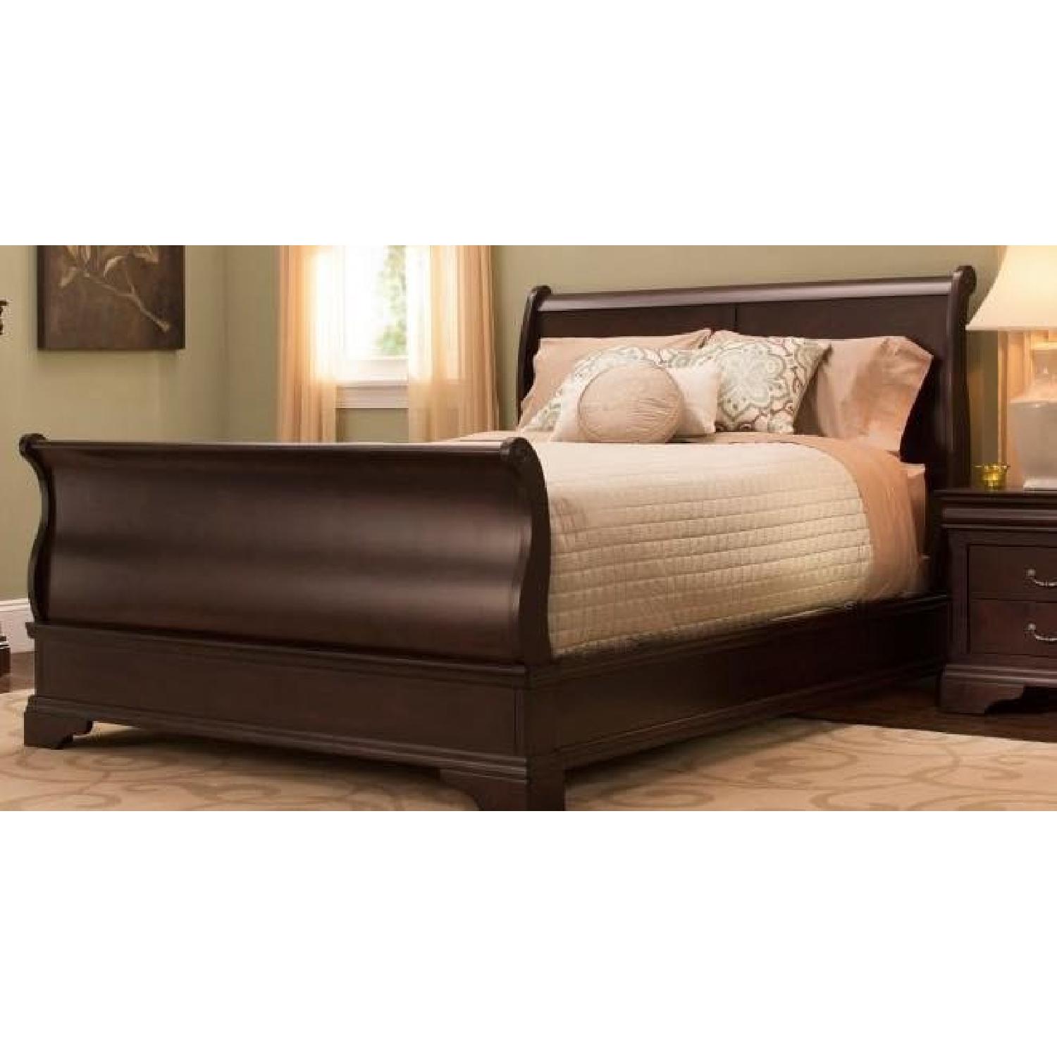 Raymour & Flanigan Cherry Wood Sleigh Bed AptDeco