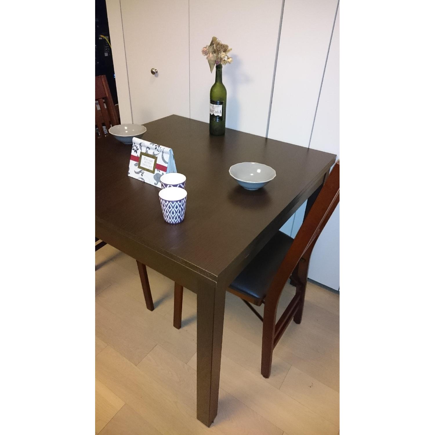 IKEA BJURSTA ビュースター ダイニングテーブル ダークブラウン Ikea Bjursta Extendable Dining Table - AptDeco