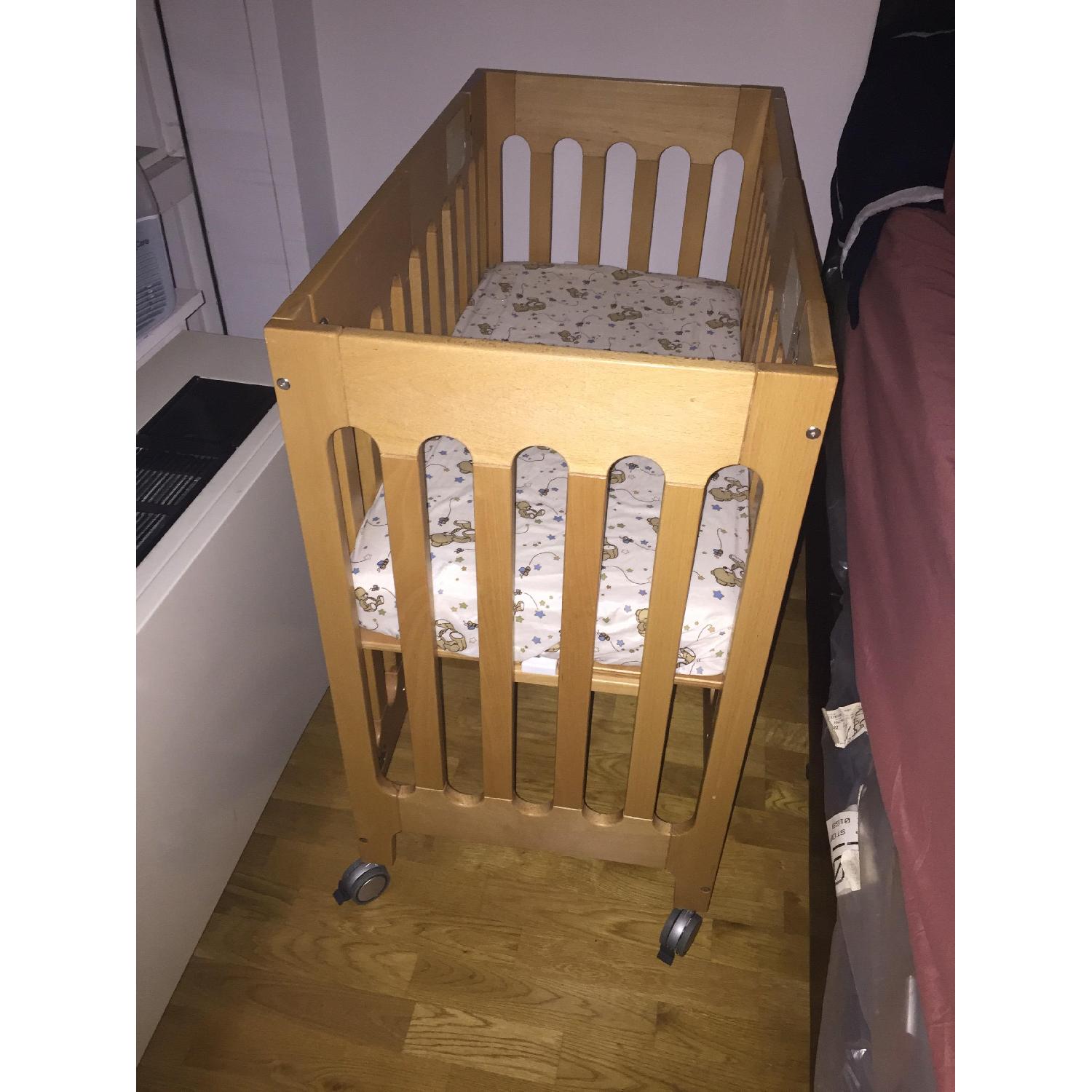 Bloom Mini Crib AptDeco