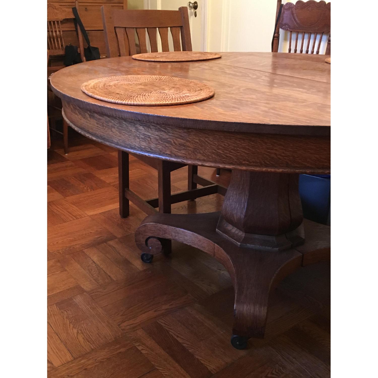Atlantic Avenue Round Antique Oak Dining Table w/ 4 Leaves - image-1