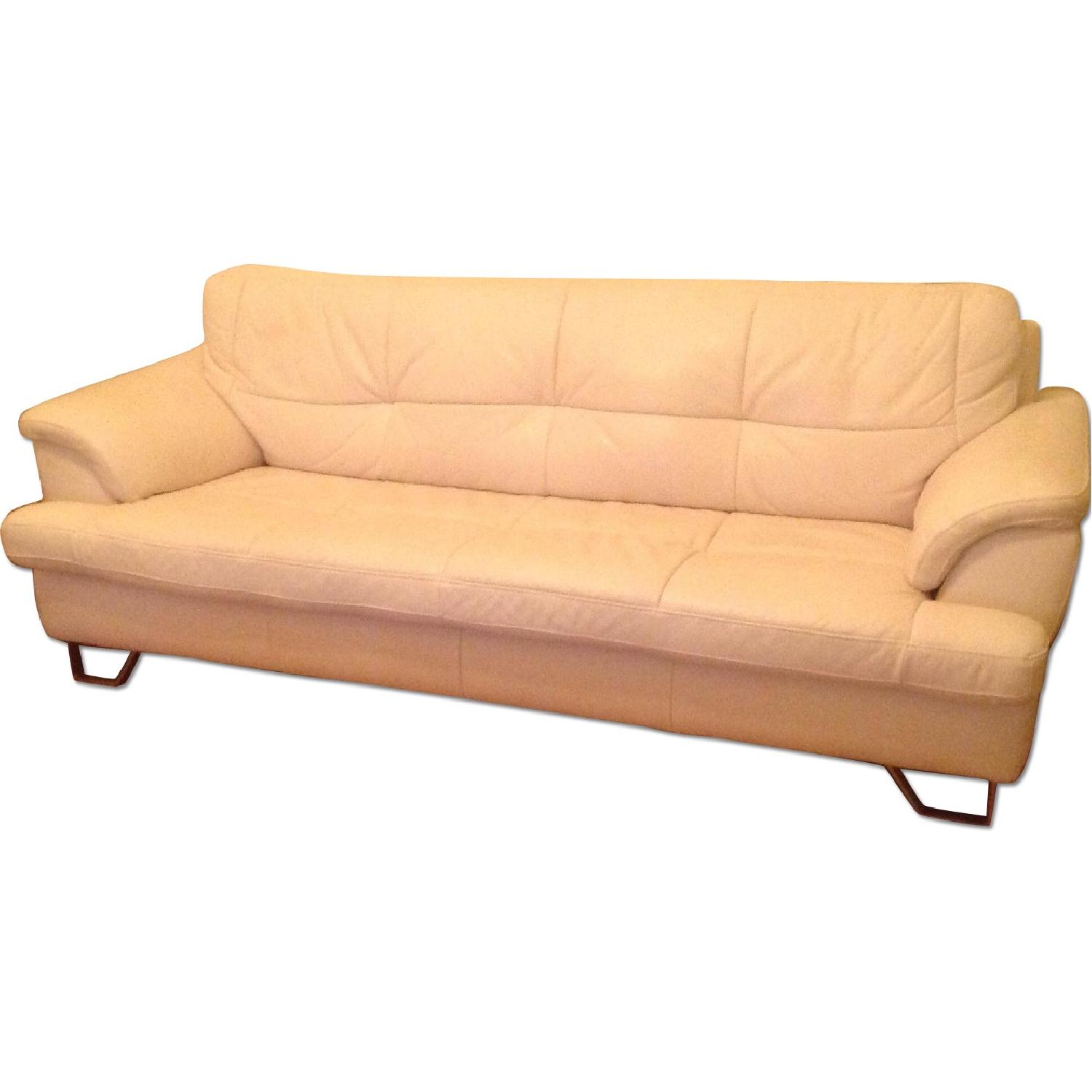 Ashley's Gunter White Leather Sofa - image-0