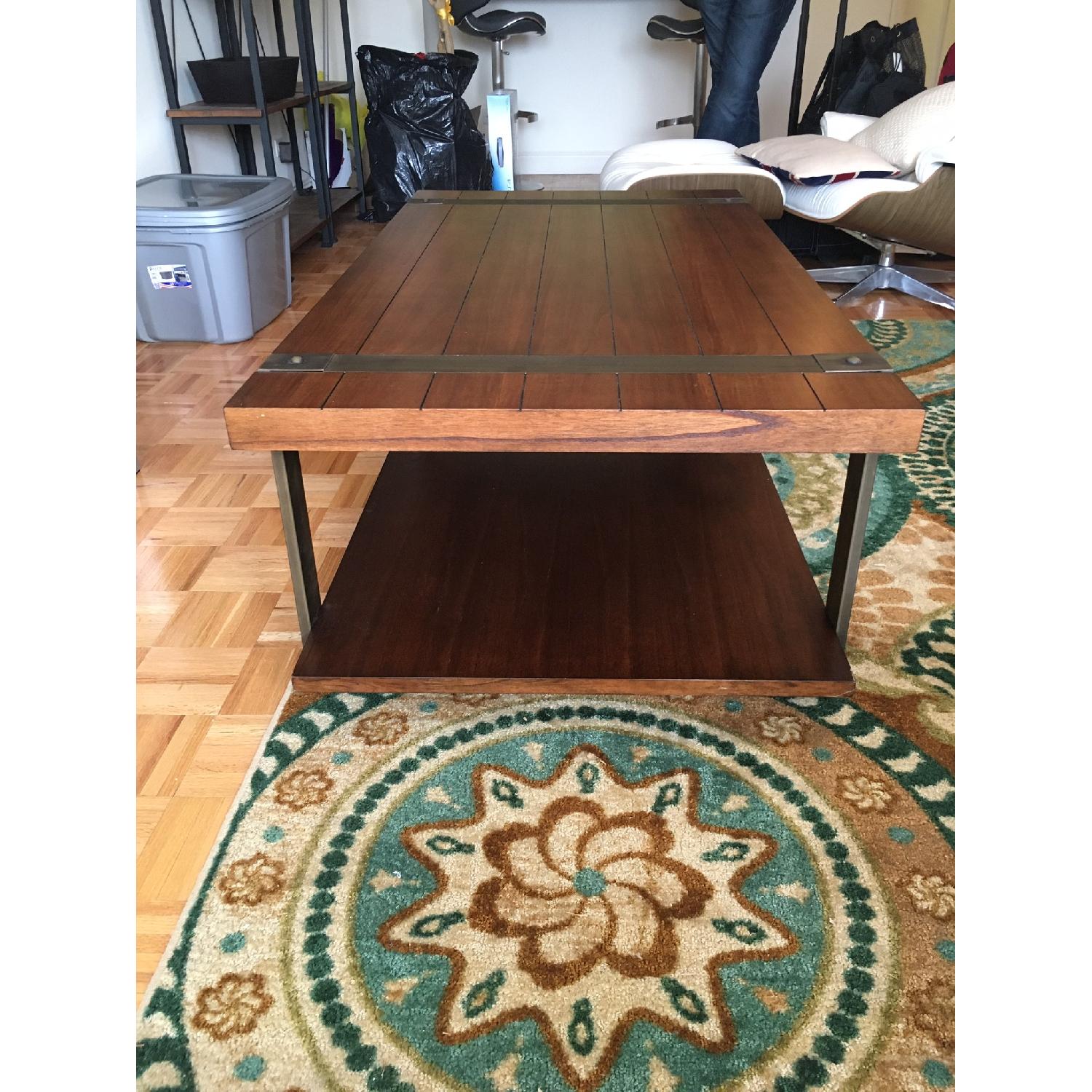 Tribecca Home Brass and Reclaimed Wood Rolling Coffee Table AptDeco