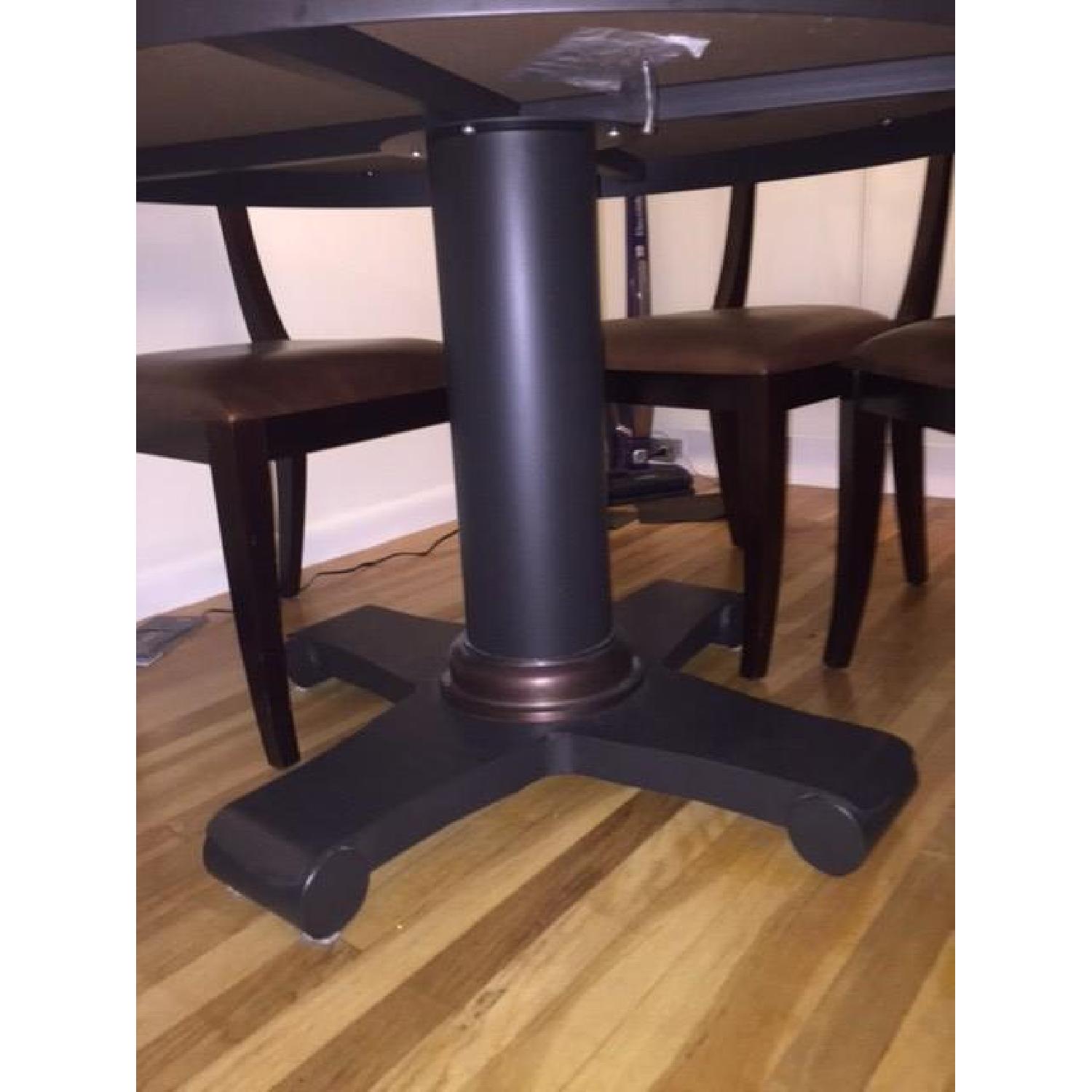 Crate & Barrel Copper Top Dining Table AptDeco