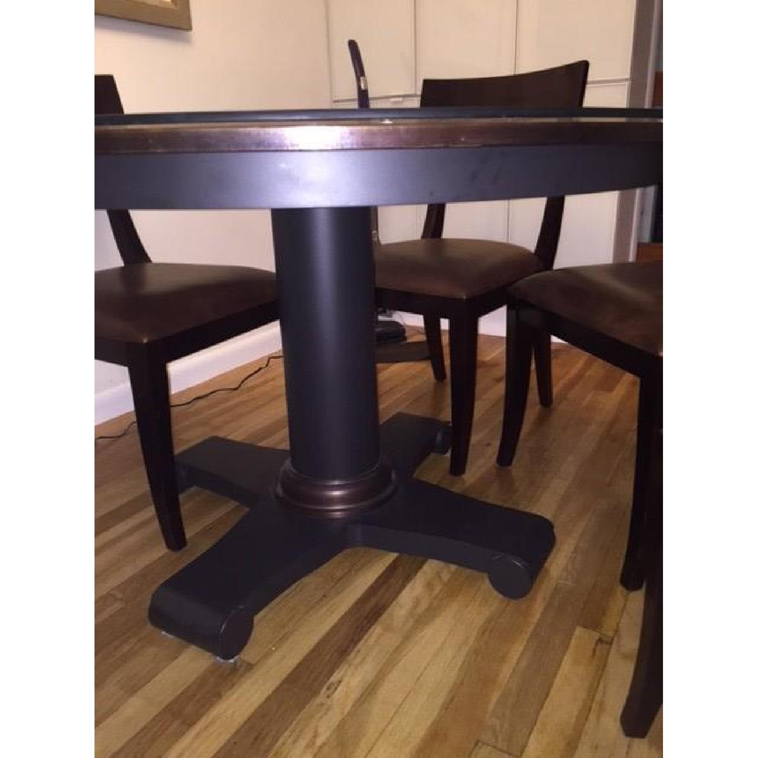 Crate & Barrel Copper Top Dining Table AptDeco