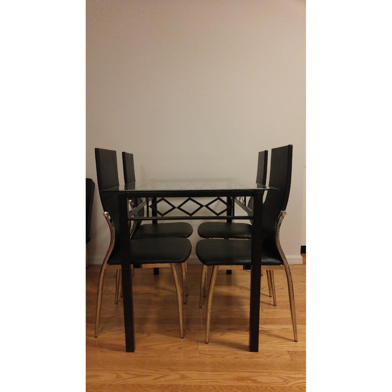 Glass Dining Table w/ 4 Leather Chairs - AptDeco