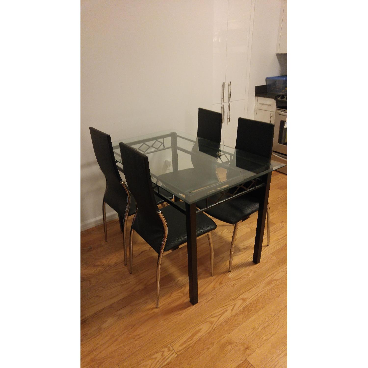 Glass Dining Table w/ 4 Leather Chairs - AptDeco